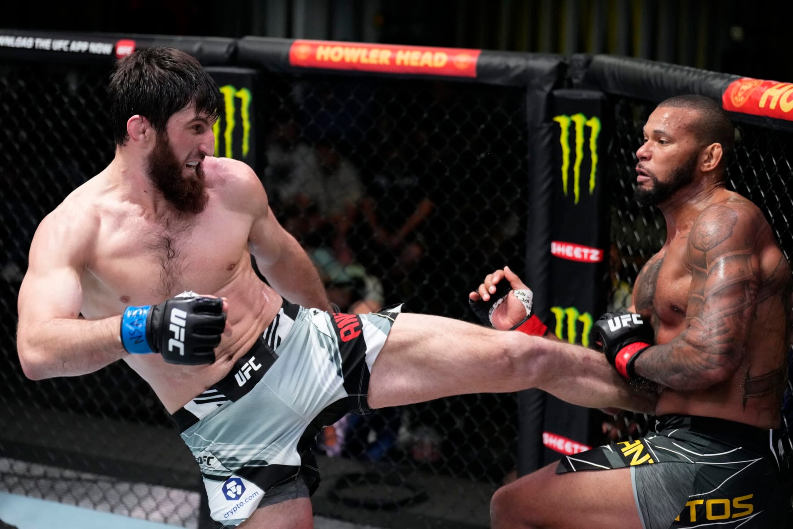 LAS VEGAS, NEVADA - MARCH 12: (L-R) Magomed Ankalaev of Russia kicks Thiago Santos of Brazil in their light heavyweight fight during the UFC Fight Night event at UFC APEX on March 12, 2022 in Las Vegas, Nevada. (Photo by Chris Unger/Zuffa LLC)
