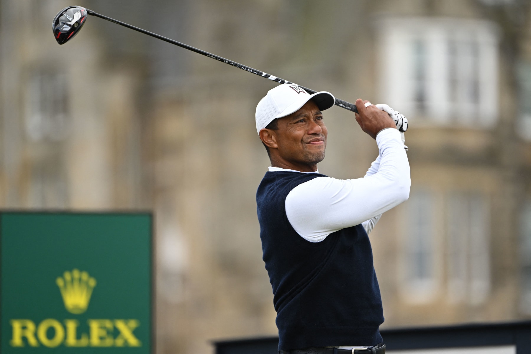 US golfer Tiger Woods watches his drive from the 2nd tee during his opening round on the first day of The 150th British Open Golf Championship on The Old Course at St Andrews in Scotland on July 14, 2022. - RESTRICTED TO EDITORIAL USE (Photo by Paul ELLIS / AFP) / RESTRICTED TO EDITORIAL USE (Photo by PAUL ELLIS/AFP via Getty Images)