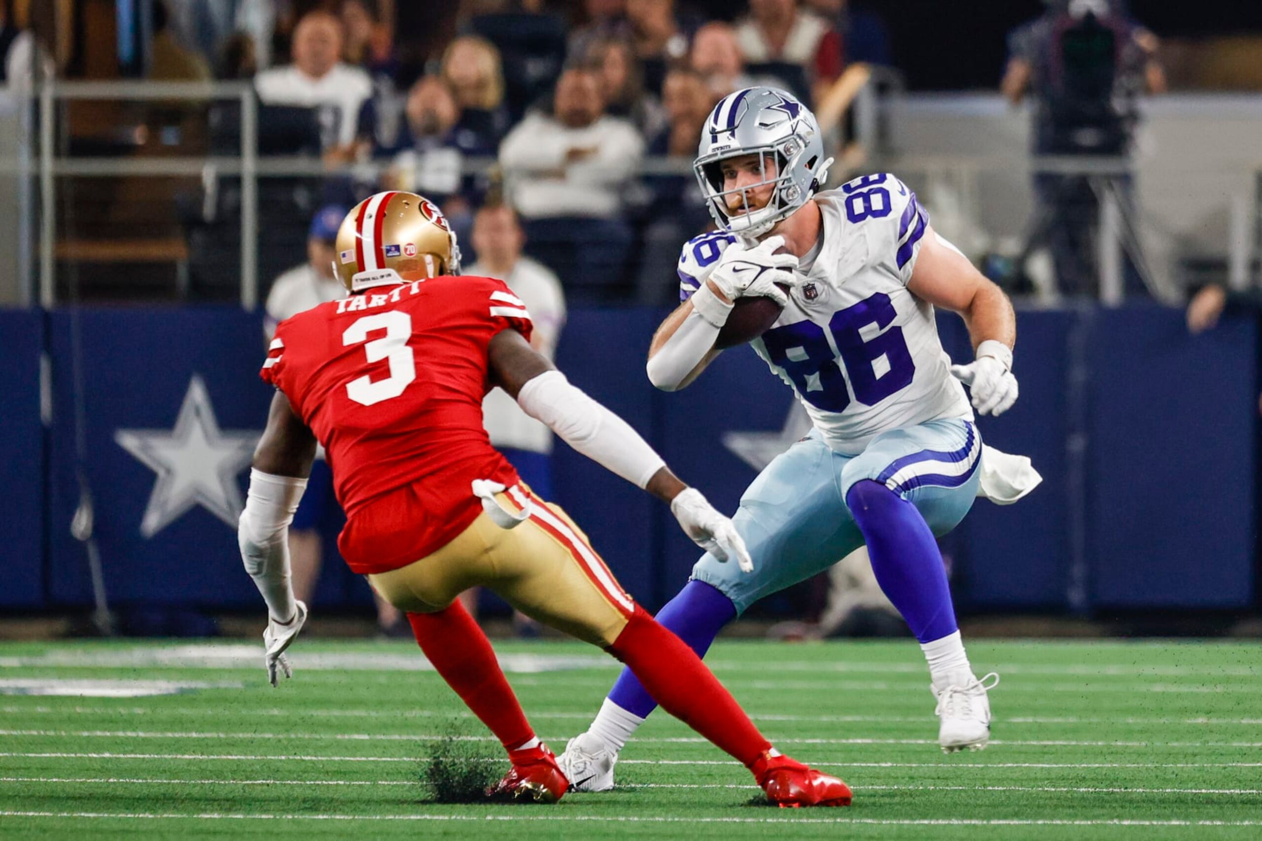 ARLINGTON, TX - JANUARY 16: Dallas Cowboys tight end Dalton Schultz (86) tries to run around San Francisco 49ers safety Jaquiski Tartt (3) during the NFC Wild Card game between the Dallas Cowboys and the San Francisco 49ers on January 16, 2022 at AT&T Stadium in Arlington, Texas. (Photo by Matthew Pearce/Icon Sportswire via Getty Images)