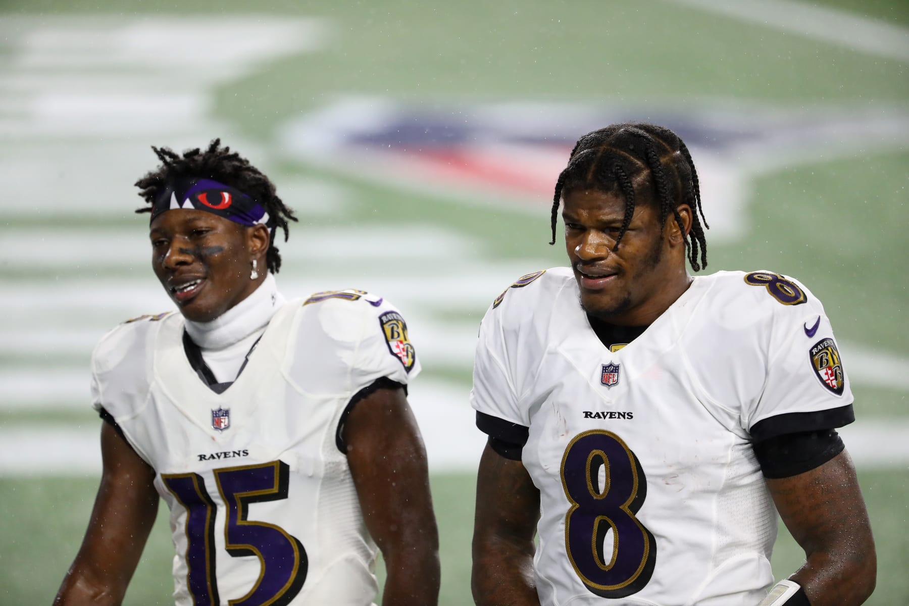 FOXBOROUGH, MASSACHUSETTS - NOVEMBER 15: Lamar Jackson #8 and Marquise Brown #15 of the Baltimore Ravens walk to the locker room at the end of the first half against the New England Patriots at Gillette Stadium on November 15, 2020 in Foxborough, Massachusetts. (Photo by Maddie Meyer/Getty Images)