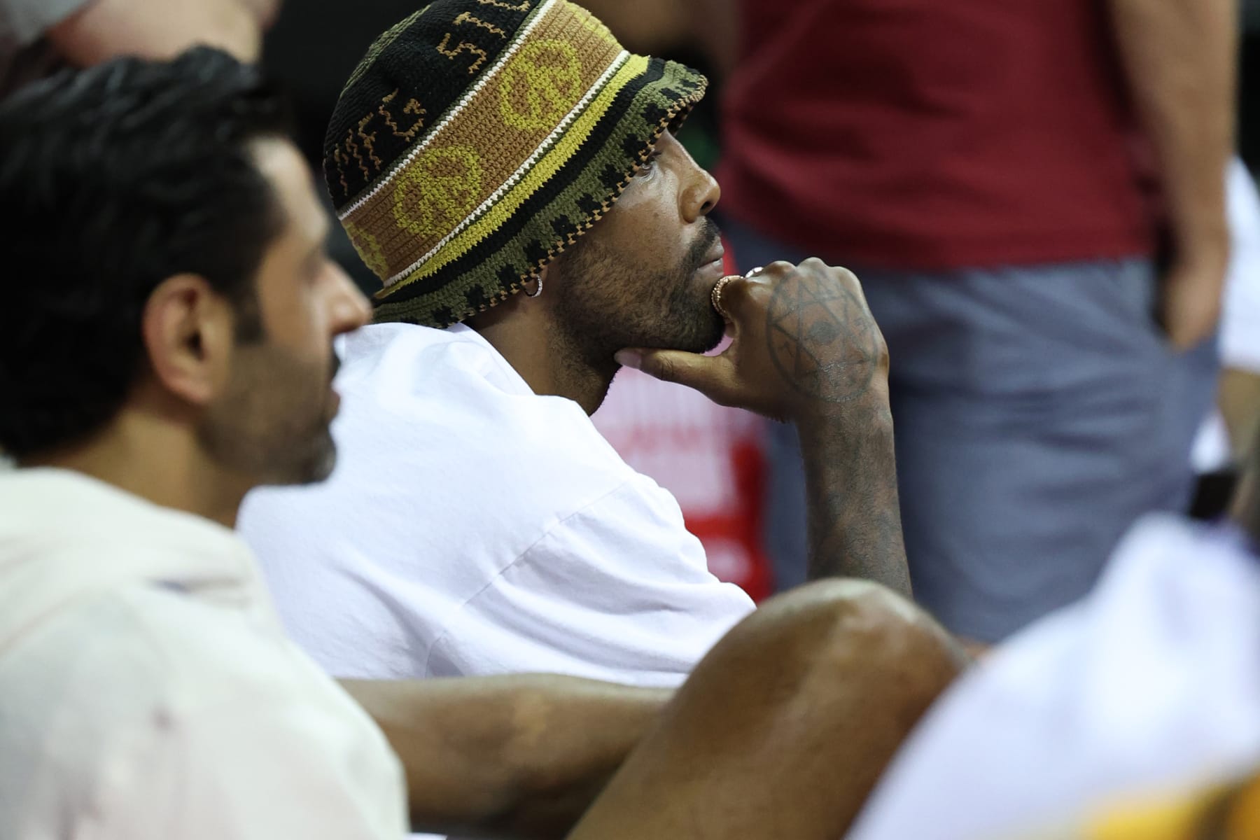 LAS VEGAS, NV - JULY 9:  Kyrie Irving of the Brooklyn Nets takes in the game of the Oklahoma City Thunder against the Houston Rockets during the 2022 NBA Summer League at the Thomas & Mack Center on July 9, 2022 in Las Vegas, Nevada.  NOTE TO USER: User expressly acknowledges and agrees that, by downloading and/or using this Photograph, user is consenting to the terms and conditions of the Getty Images License Agreement. Mandatory Copyright Notice: Copyright 2022 NBAE (Photo by Brian Choi/NBAE via Getty Images)