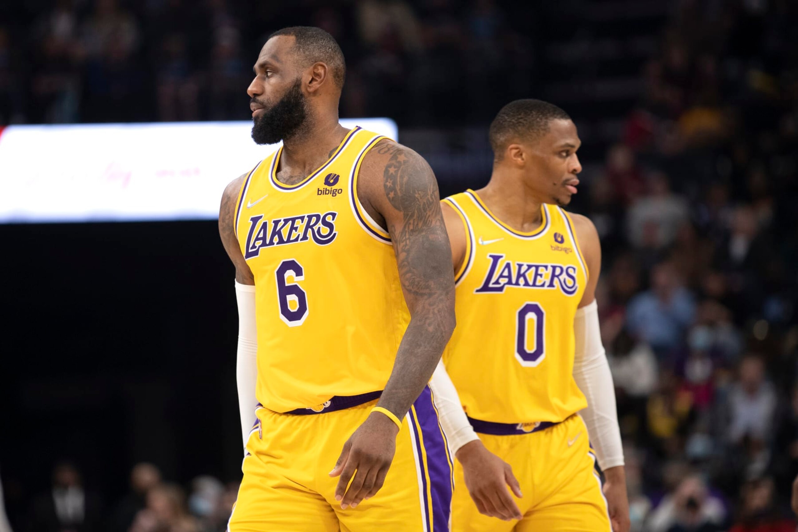Los Angeles Lakers forward LeBron James (6) and guard Russell Westbrook move in different directions during a break in game action in the second half of an NBA basketball game against the Memphis Grizzlies Wednesday, Dec. 29, 2021, in Memphis, Tenn. (AP Photo/Nikki Boertman)