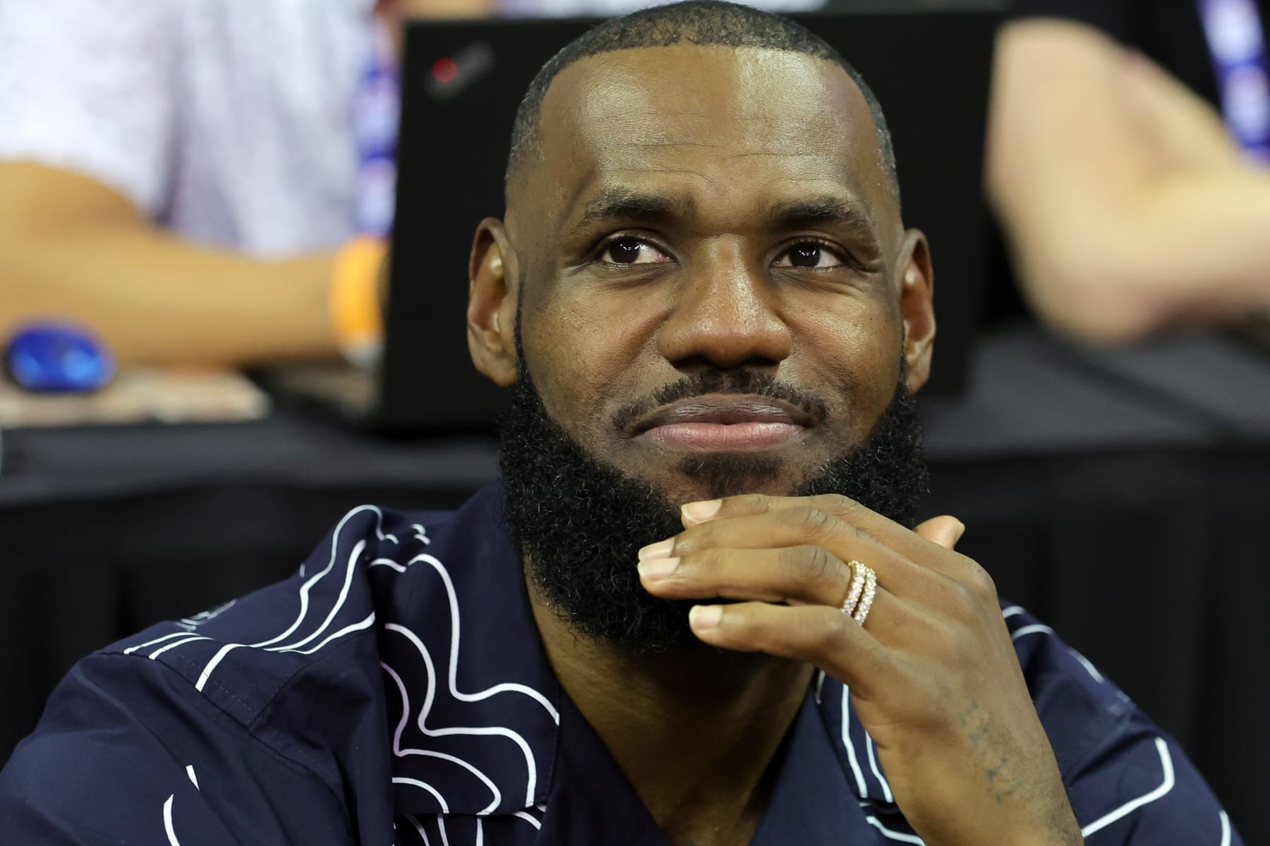 LAS VEGAS, NEVADA - JULY 08: LeBron James of the Los Angeles Lakers attends a game between the Lakers and the Phoenix Suns during the 2022 NBA Summer League at the Thomas & Mack Center on July 08, 2022 in Las Vegas, Nevada. NOTE TO USER: User expressly acknowledges and agrees that, by downloading and or using this photograph, User is consenting to the terms and conditions of the Getty Images License Agreement. (Photo by Ethan Miller/Getty Images)