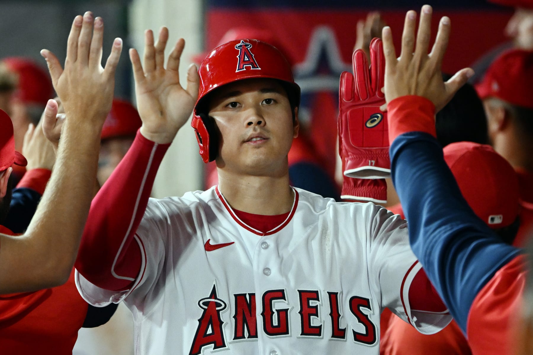 ANAHEIM, CA - JULY 13: Los Angeles Angels pitcher Shohei Ohtani (17) in the dugout after scoring on a hit in the sixth inning of an MLB baseball game against the Houston Astros played on July 13, 2022 at Angel Stadium in Anaheim, CA. (Photo by John Cordes/Icon Sportswire via Getty Images)