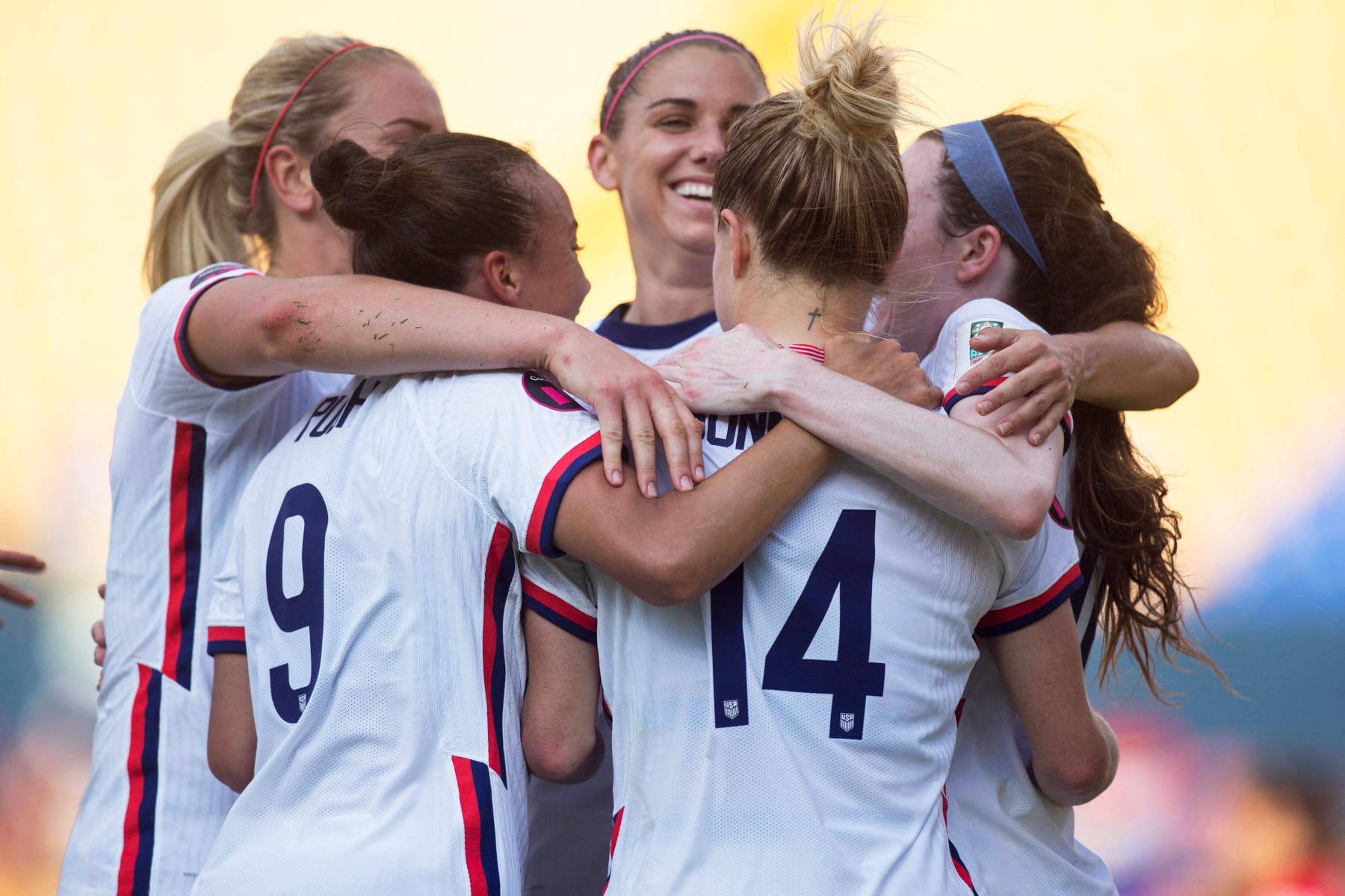 US' Emily Sonnett (R) celebrates with teammates after scoring against Costa Rica during the 2022 Concacaf Women's Championship football match at the Universitario stadium in Monterrey, Mexico, on July 14, 2022. (Photo by Julio Cesar AGUILAR / AFP) (Photo by JULIO CESAR AGUILAR/AFP via Getty Images)