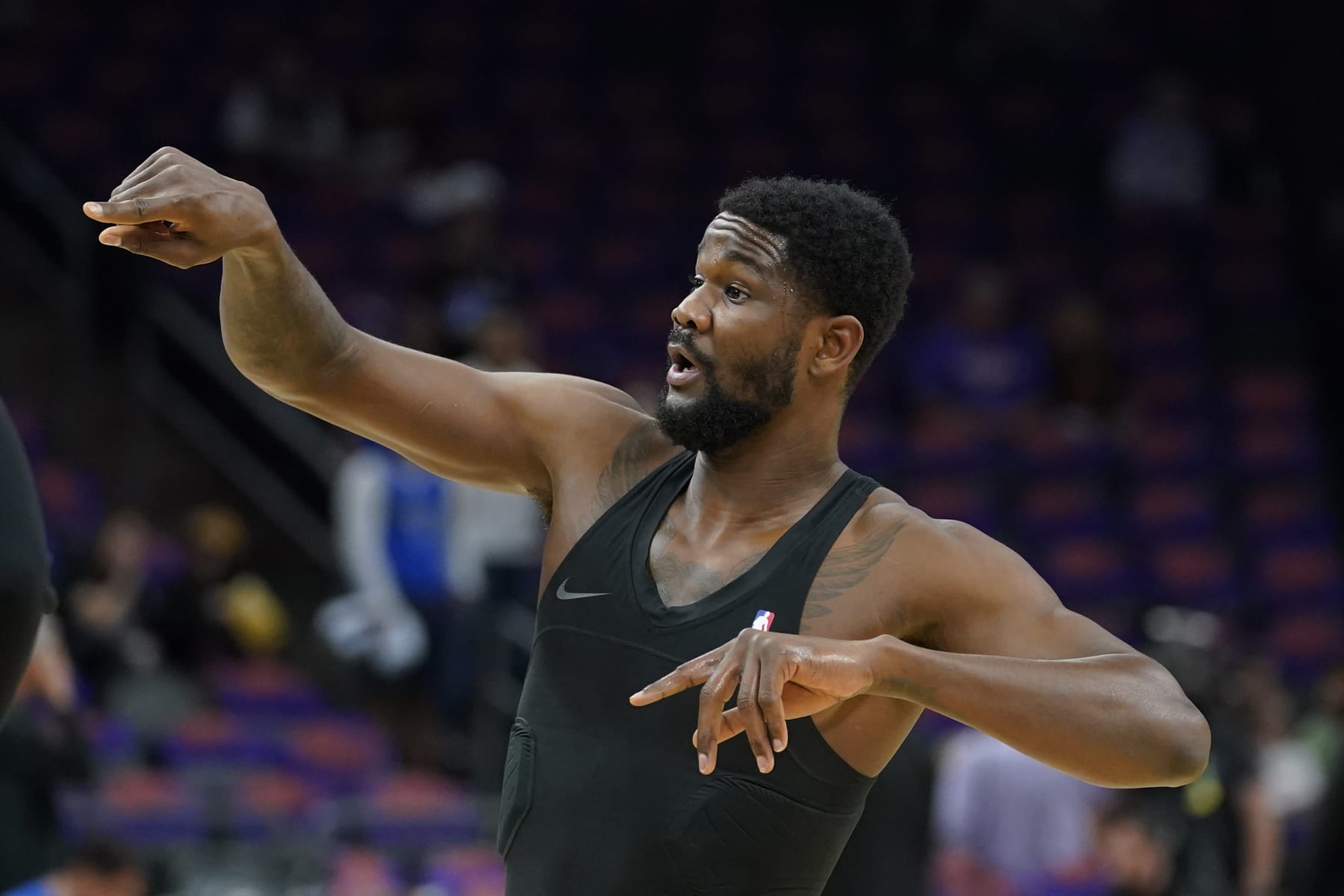 Phoenix Suns center Deandre Ayton during warmups before Game 1 in the second round of the NBA Western Conference playoff series against the Dallas Mavericks, Monday, May 2, 2022, in Phoenix. (AP Photo/Matt York)
