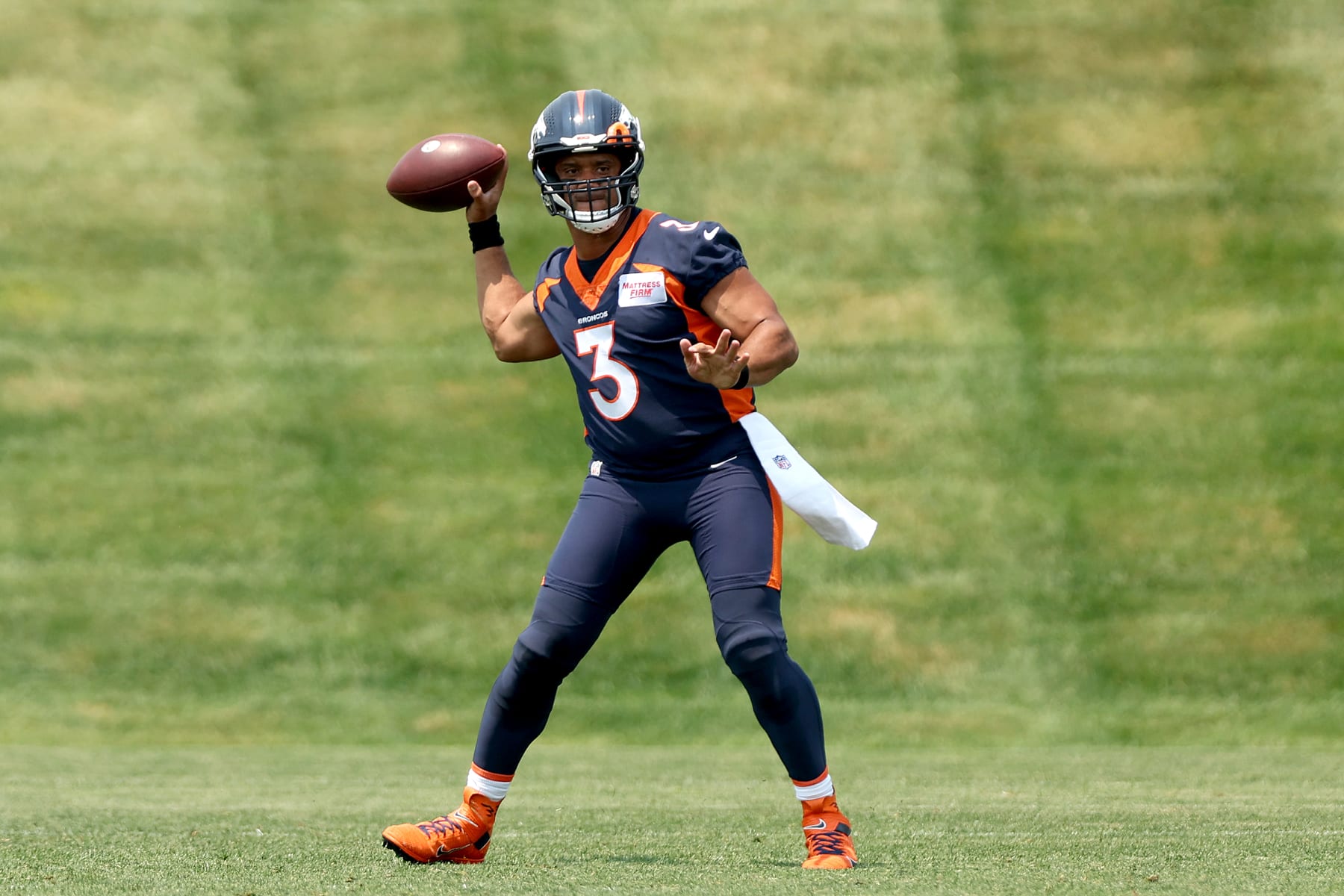 ENGLEWOOD, COLORADO - JUNE 13: Quarterback Russell Wilson #3 of the Denver Broncos throws during a mandatory mini-camp at UCHealth Training Center on June 13, 2022 in Englewood, Colorado. (Photo by Matthew Stockman/Getty Images)