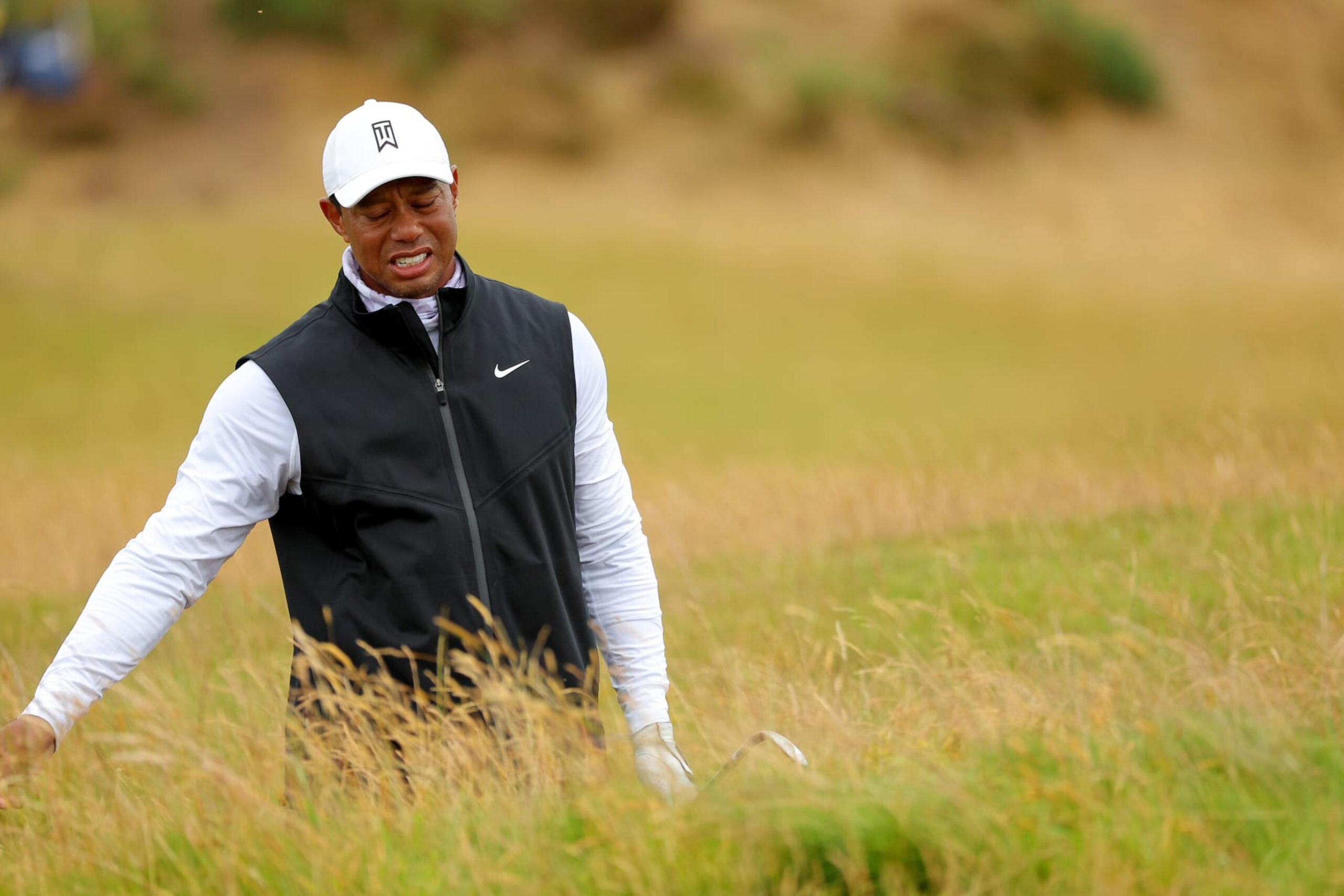 ST ANDREWS, SCOTLAND - JULY 15: Tiger Woods of the United States reacts on the 6th hole during Day Two of The 150th Open at St Andrews Old Course on July 15, 2022 in St Andrews, Scotland. (Photo by Kevin C. Cox/Getty Images)
