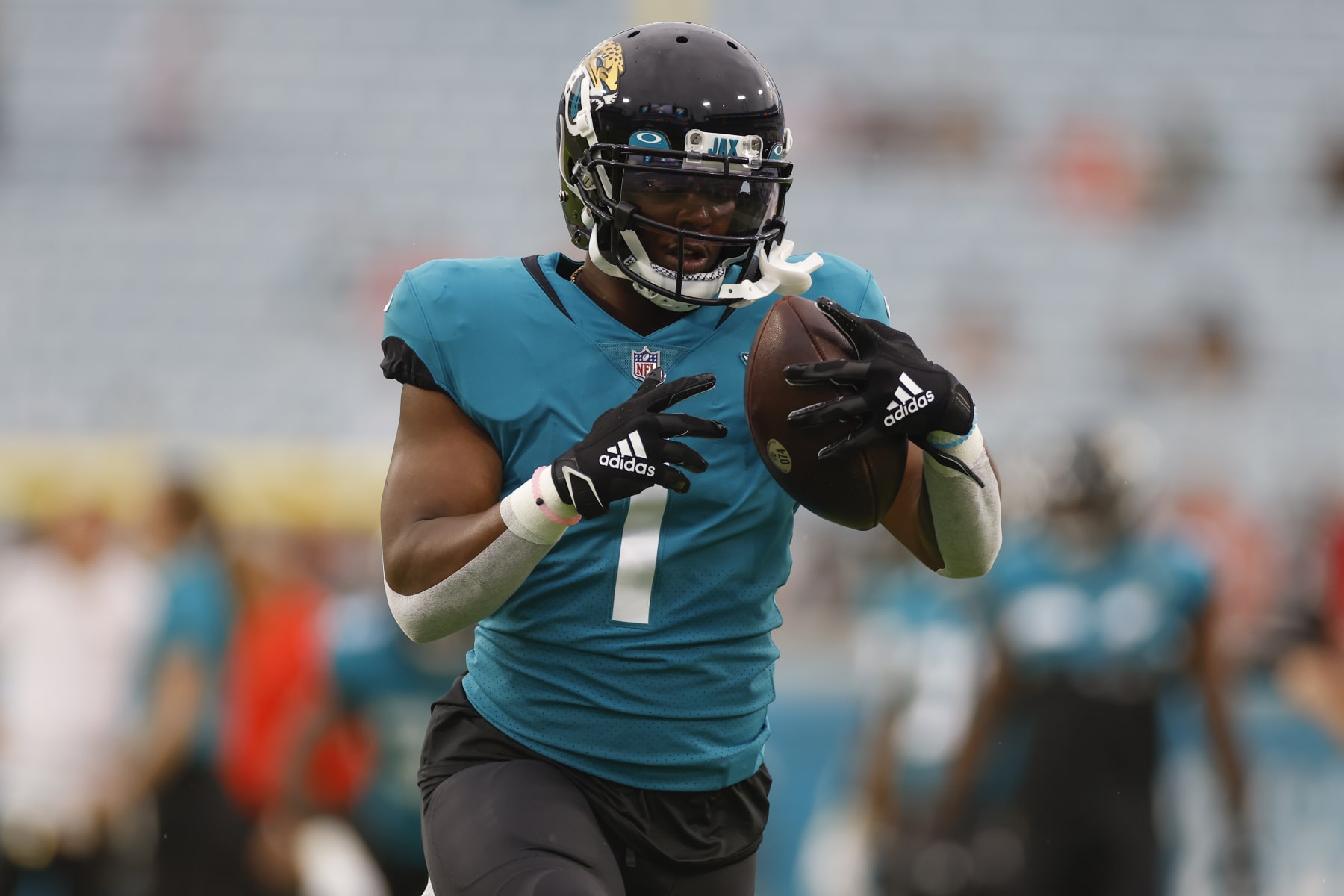 JACKSONVILLE, FL - AUGUST 14: Jacksonville Jaguars Running Back Travis Etienne Jr. (1) during the preseason game between the Cleveland Browns and the Jacksonville Jaguars on August 14, 2021 at TIAA Bank Field in Jacksonville, Fl. (Photo by David Rosenblum/Icon Sportswire via Getty Images)