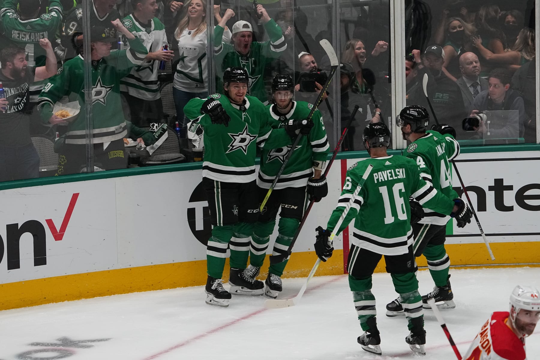 DALLAS, TX - MAY 13: Roope Hintz #24, John Klingberg #3, Joe Pavelski #16, Joel Hanley #44 and the Dallas Stars celebrate a goal against the Calgary Flames in Game Six of the First Round of the 2022 Stanley Cup Playoffs at the American Airlines Center on May 13, 2022 in Dallas, Texas. (Photo by Glenn James/NHLI via Getty Images)