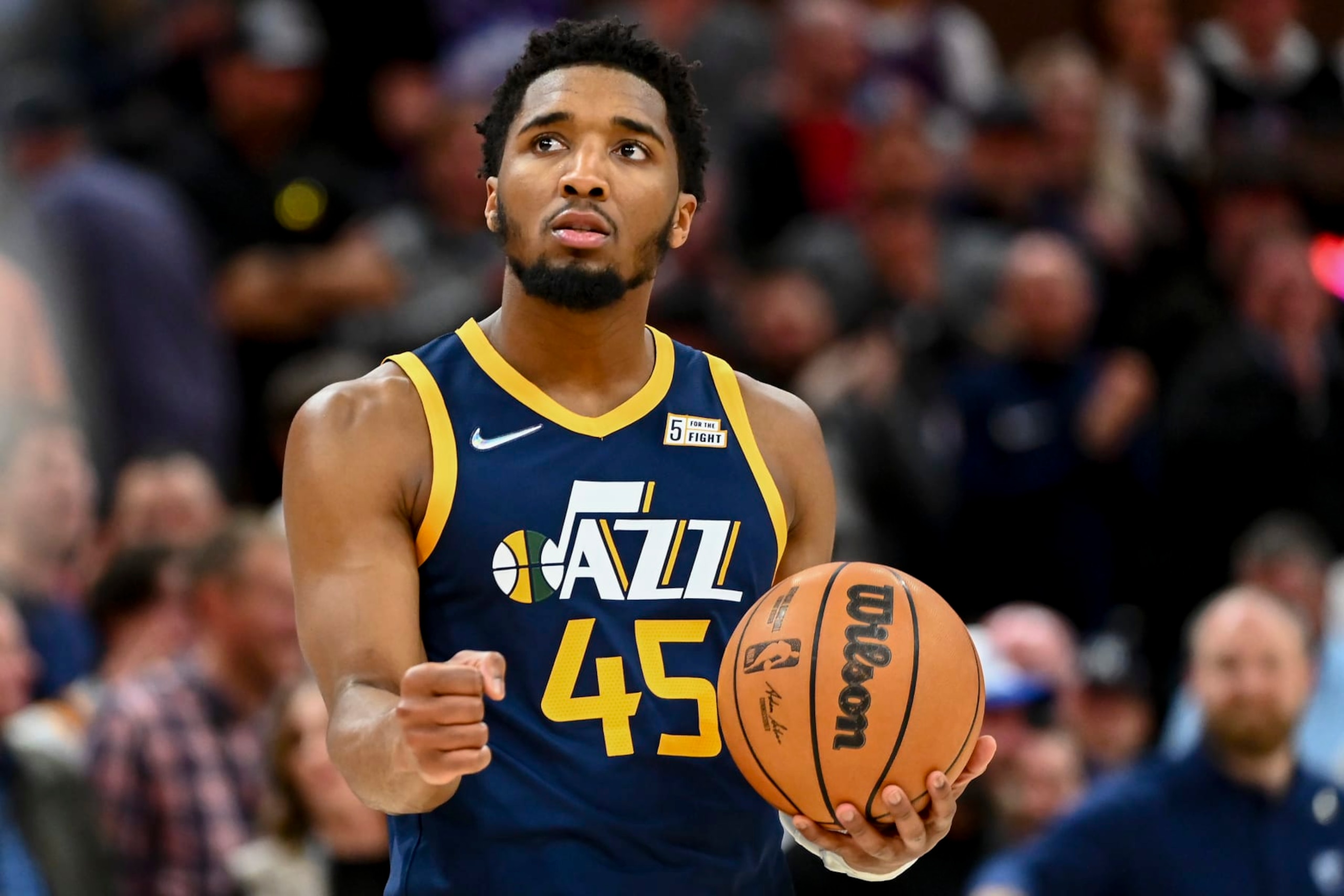 SALT LAKE CITY, UTAH - APRIL 05: Donovan Mitchell #45 of the Utah Jazz celebrates a win in overtime during a game against the Memphis Grizzlies at Vivint Smart Home Arena on April 05, 2022 in Salt Lake City, Utah. NOTE TO USER: User expressly acknowledges and agrees that, by downloading and or using this photograph, User is consenting to the terms and conditions of the Getty Images License Agreement. (Photo by Alex Goodlett/Getty Images)