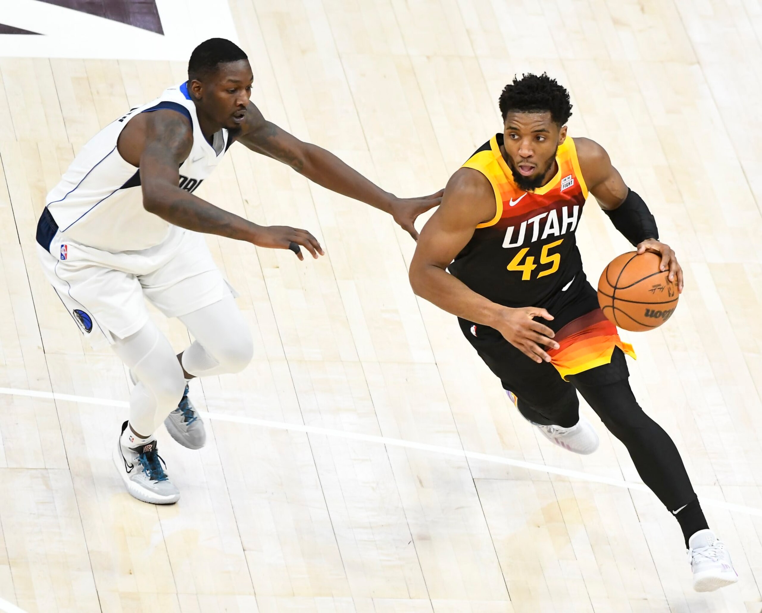 SALT LAKE CITY, UTAH - APRIL 28: Donovan Mitchell #45 of the Utah Jazz drives around Dorian Finney-Smith #10 of the Dallas Mavericks during the first half of Game 6 of the Western Conference First Round Playoffs at Vivint Smart Home Arena on April 28, 2022 in Salt Lake City, Utah. NOTE TO USER: User expressly acknowledges and agrees that, by downloading and/or using this Photograph, user is consenting to the terms and conditions of the Getty Images License Agreement. (Photo by Alex Goodlett/Getty Images) SALT LAKE CITY, UTAH - APRIL 28: Donovan Mitchell #45 of the Utah Jazz drives around Dorian Finney-Smith #10 of the Dallas Mavericks during the first half of Game 6 of the Western Conference First Round Playoffs at Vivint Smart Home Arena on April 28, 2022 in Salt Lake City, Utah. NOTE TO USER: User expressly acknowledges and agrees that, by downloading and/or using this Photograph, user is consenting to the terms and conditions of the Getty Images License Agreement. (Photo by Alex Goodlett/Getty Images)