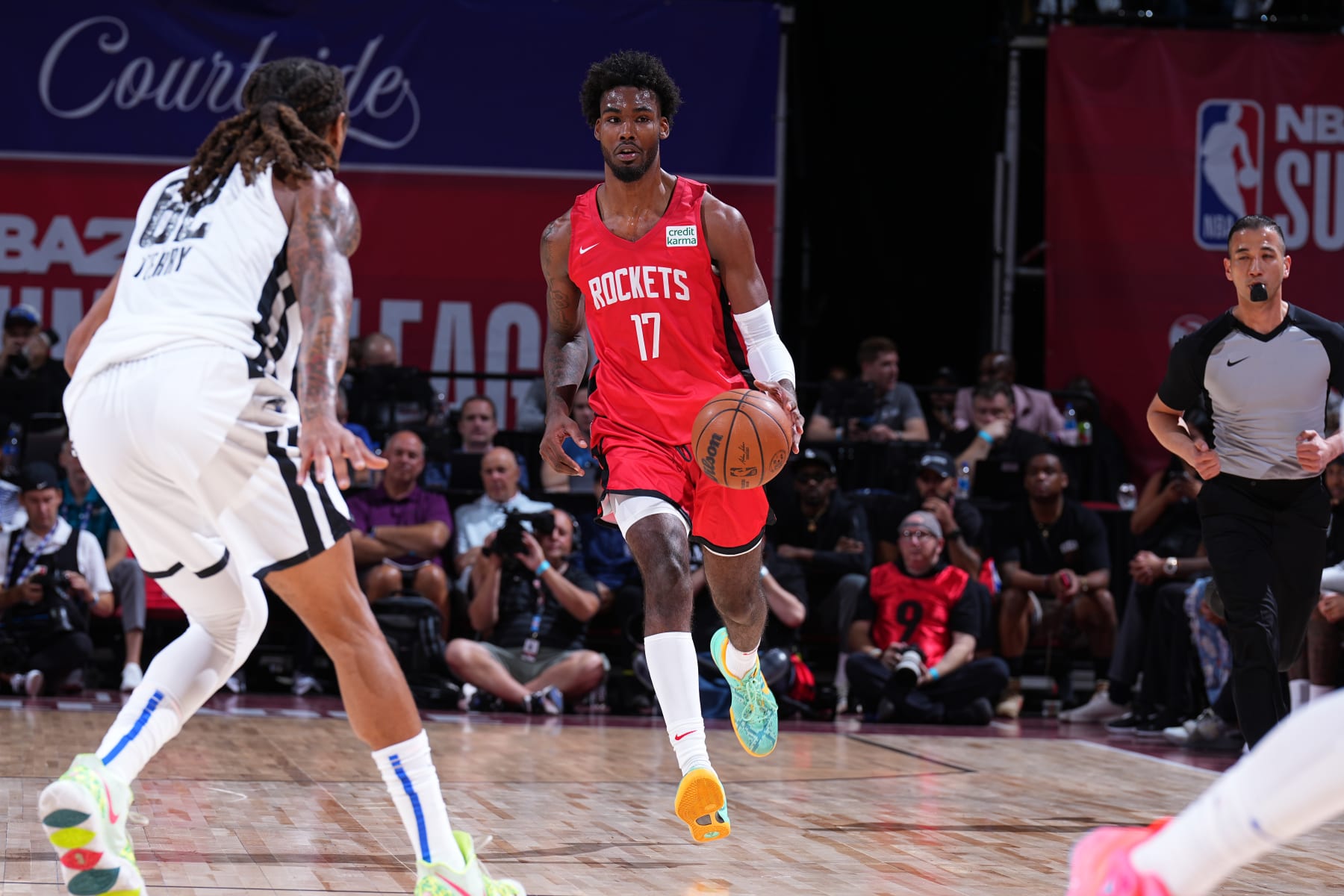 LAS VEGAS, NV - JULY 7: Tari Eason #17 of the Houston Rockets dribbles the ball against the Orlando Magic during the 2022 Las Vegas Summer League on July 7, 2022 at the Thomas & Mack Center in Las Vegas, Nevada NOTE TO USER: User expressly acknowledges and agrees that, by downloading and/or using this Photograph, user is consenting to the terms and conditions of the Getty Images License Agreement. Mandatory Copyright Notice: Copyright 2022 NBAE (Photo by Garrett Ellwood/NBAE via Getty Images)