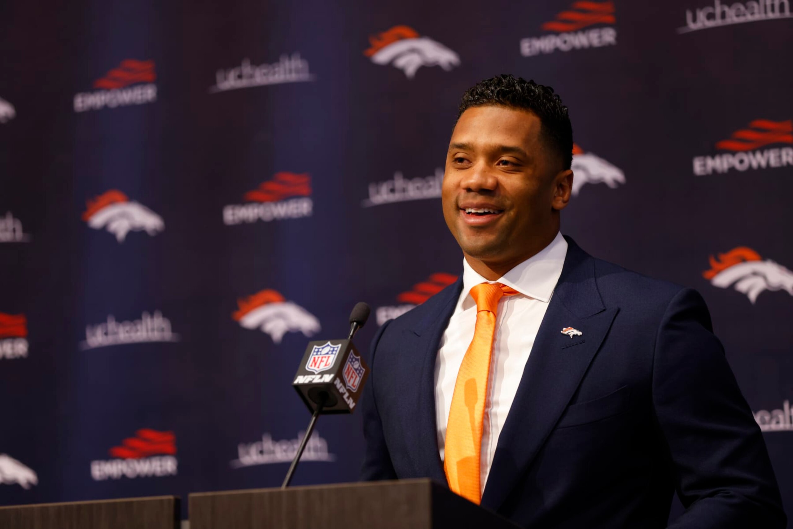 ENGLEWOOD, CO - MARCH 16:  Quarterback Russell Wilson #3 of the Denver Broncos addresses the media at UCHealth Training Center on March 16, 2022 in Englewood, Colorado. (Photo by Justin Edmonds/Getty Images)