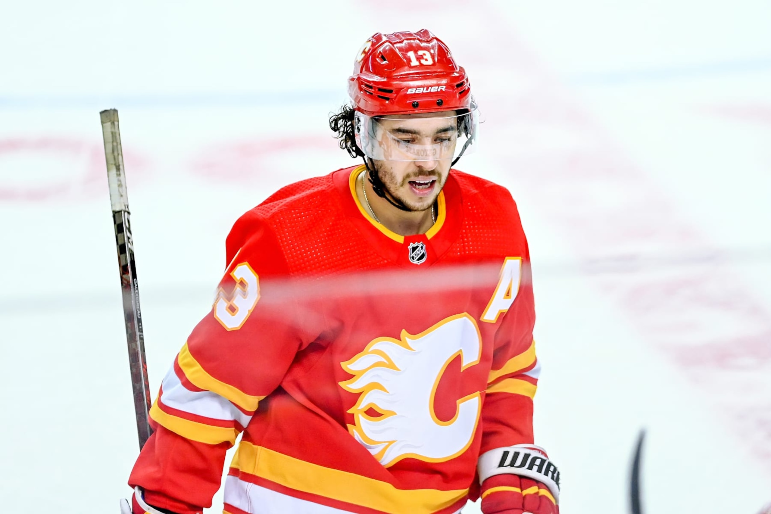 CALGARY, AB - MAY 15: Calgary Flames Left Wing Johnny Gaudreau (13) skates to the bench during the third period of game 7 of the first round of the NHL Stanley Cup Playoffs between the Calgary Flames and the Dallas Stars on May 15, 2022, at the Scotiabank Saddledome in Calgary, AB. (Photo by Brett Holmes/Icon Sportswire via Getty Images)