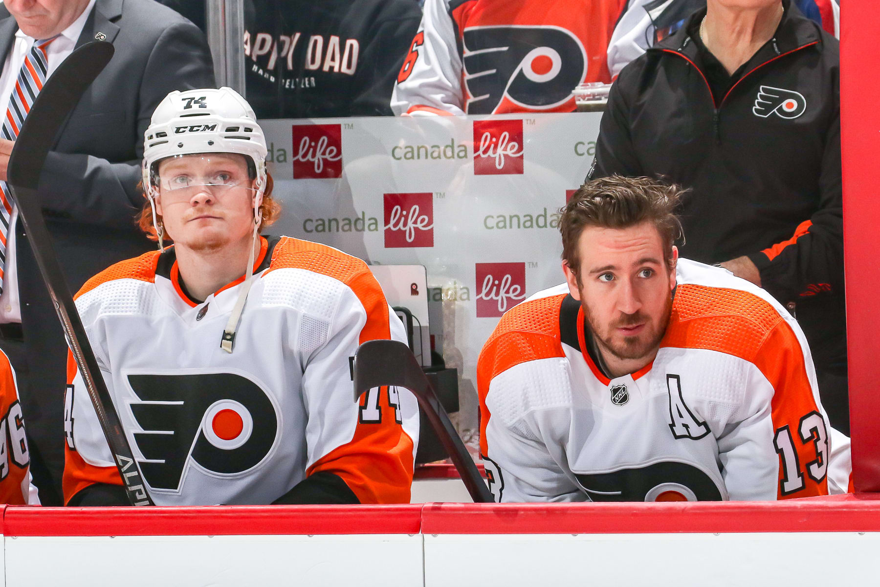 WINNIPEG, MB - APRIL 27: Owen Tippett #74 and Kevin Hayes #13 of the Philadelphia Flyers look on from the bench prior to puck drop against the Winnipeg Jets at the Canada Life Centre on April 27, 2022 in Winnipeg, Manitoba, Canada. (Photo by Jonathan Kozub/NHLI via Getty Images) WINNIPEG, MB - APRIL 27: Owen Tippett #74 and Kevin Hayes #13 of the Philadelphia Flyers look on from the bench prior to puck drop against the Winnipeg Jets at the Canada Life Centre on April 27, 2022 in Winnipeg, Manitoba, Canada. (Photo by Jonathan Kozub/NHLI via Getty Images)