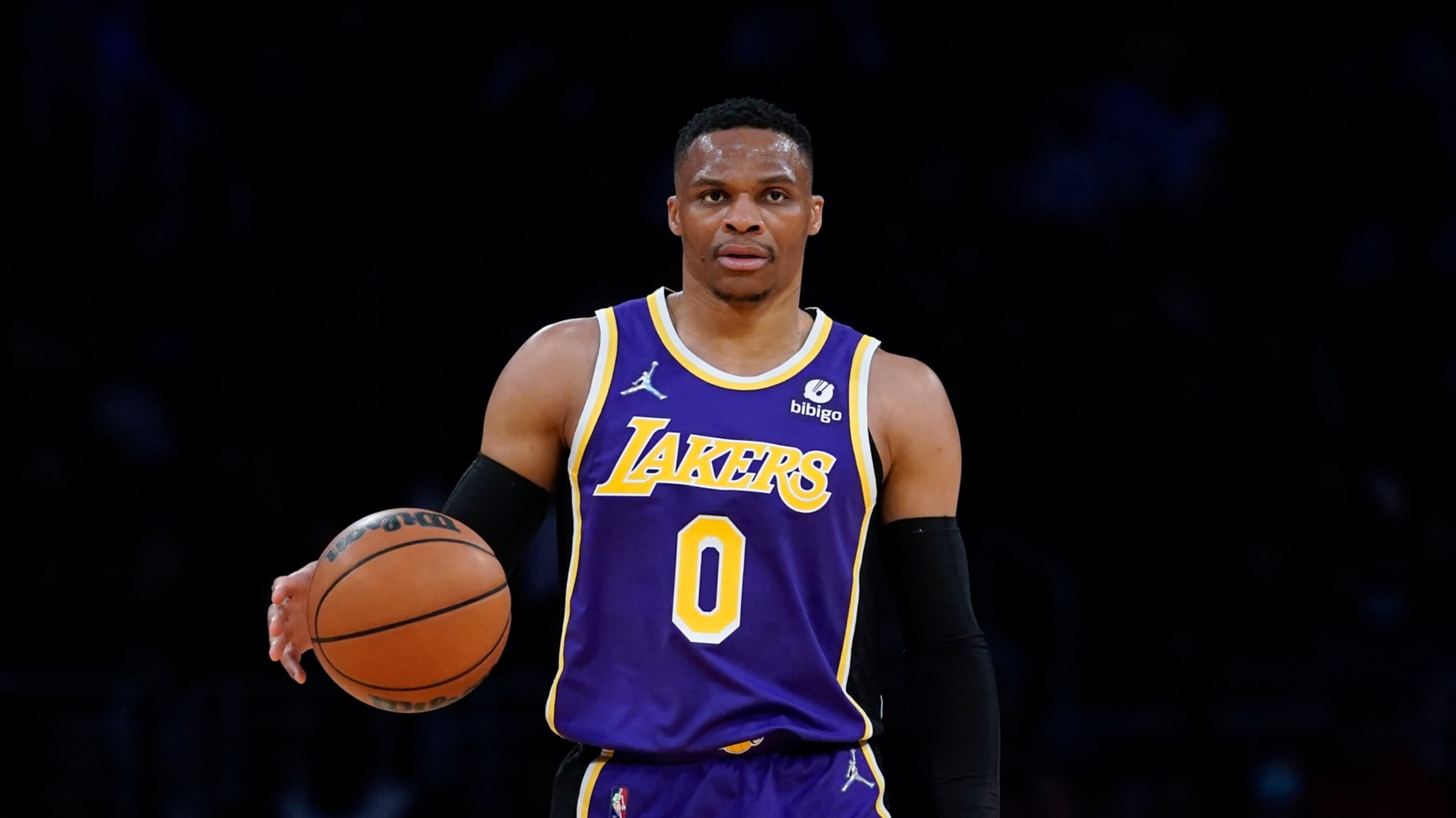 Los Angeles Lakers guard Russell Westbrook (0) controls the ball during an NBA basketball game against the Philadelphia 76ers in Los Angeles, Wednesday, March 23, 2022. (AP Photo/Ashley Landis) Los Angeles Lakers guard Russell Westbrook (0) controls the ball during an NBA basketball game against the Philadelphia 76ers in Los Angeles, Wednesday, March 23, 2022. (AP Photo/Ashley Landis)