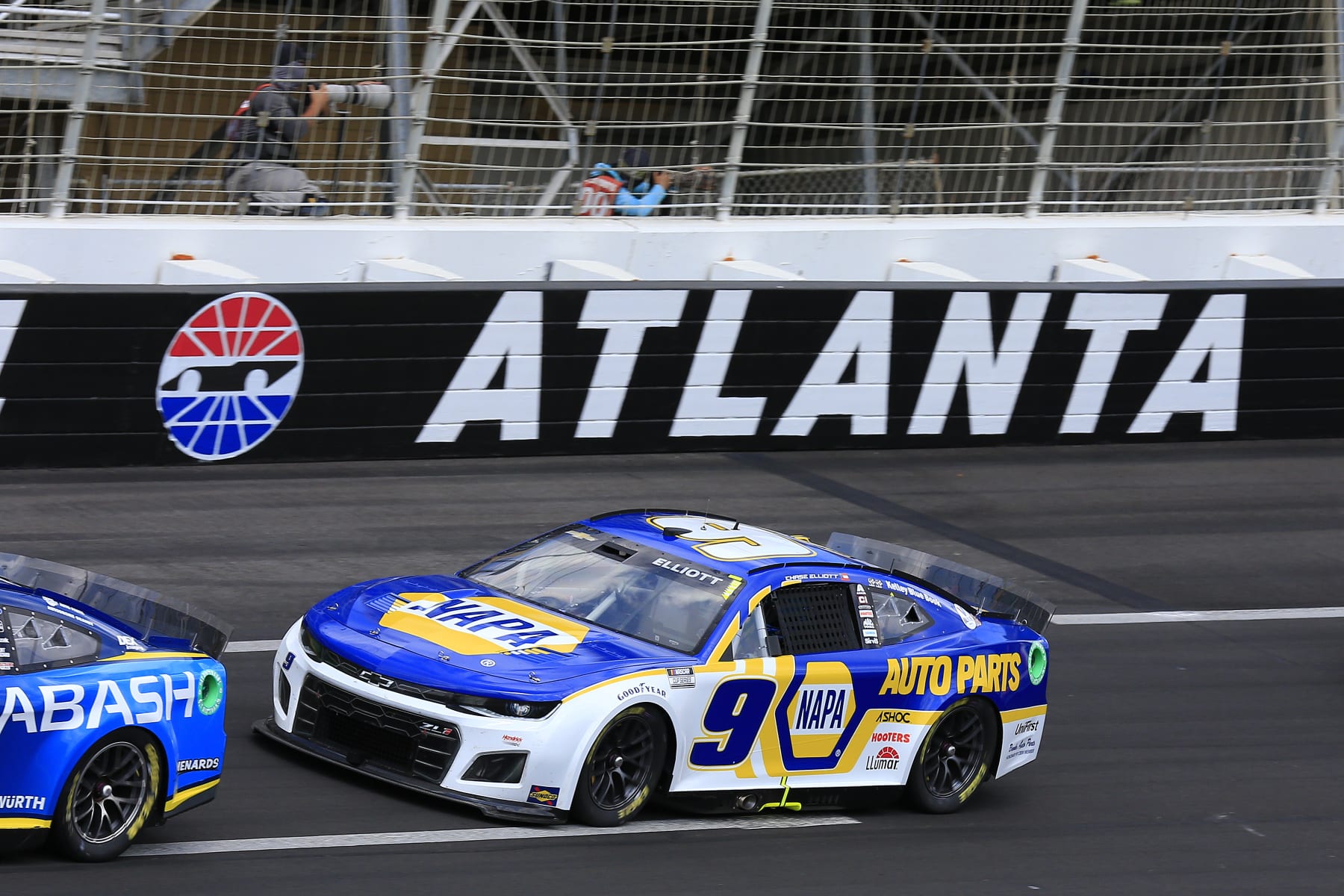 ATLANTA, GA - JULY 10: Chase Elliott (#9 Hendrick Motorsports NAPA Auto Parts Chevrolet) raves through Turn 4 during the 53rd Annual Quaker State 400 NASCAR race on July 10, 2022 at the Atlanta Motor Speedway in Hampton, Georgia.  (Photo by David J. Griffin/Icon Sportswire via Getty Images)