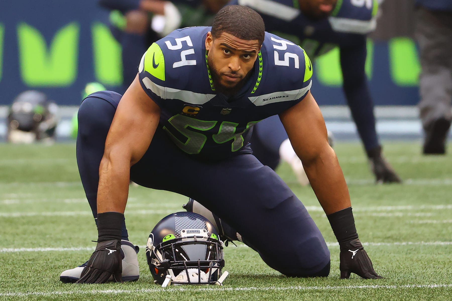 SEATTLE, WASHINGTON - JANUARY 02: Bobby Wagner #54 of the Seattle Seahawks stretches before the game against the Detroit Lions at Lumen Field on January 02, 2022 in Seattle, Washington. (Photo by Abbie Parr/Getty Images)