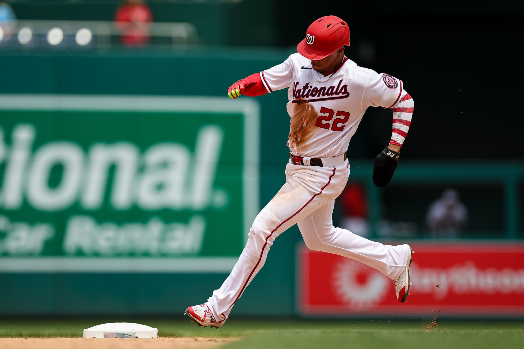 WASHINGTON, DC - JULY 13: Juan Soto #22 of the Washington Nationals rounds second base against the Seattle Mariners during the seventh inning of game one of a doubleheader at Nationals Park on July 13, 2022 in Washington, DC.  (Photo by Scott Taetsch/Getty Images)