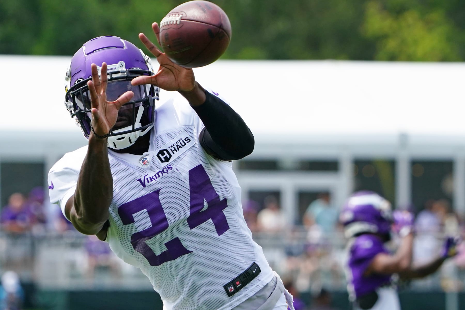EAGAN, MN - AUGUST 04: Minnesota Vikings cornerback 
Mackensie Alexander (24) catches the ball during training camp at Twin Cities Orthopedics Performance Center in Eagan, MN on August 4, 2021.(Photo by Nick Wosika/Icon Sportswire via Getty Images)