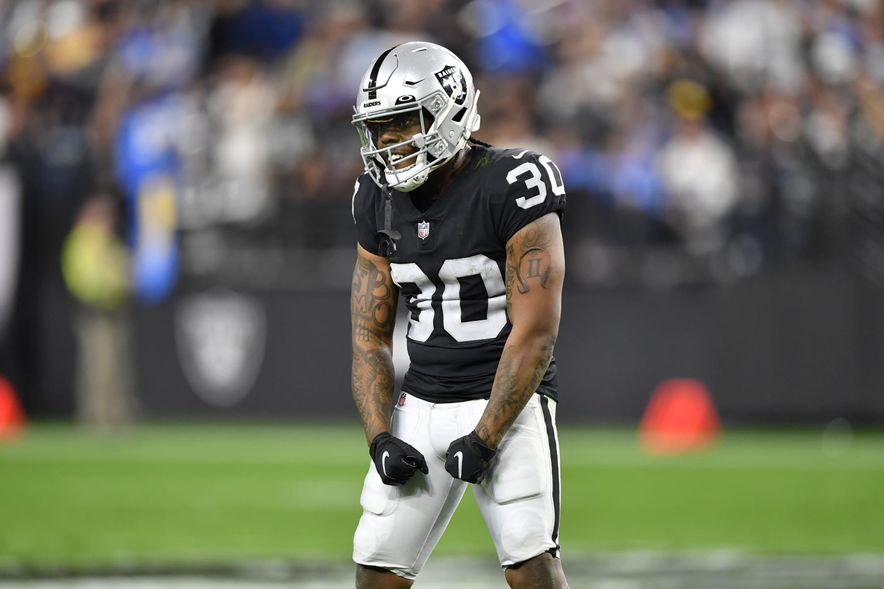 LAS VEGAS, NEVADA - JANUARY 09:  Running back Jalen Richard #30 of the Las Vegas Raiders reacts after a play during the first half of a game against the Los Angeles Chargers at Allegiant Stadium on January 09, 2022 in Las Vegas, Nevada. The Raiders defeated the Chargers 35-32 in overtime. (Photo by Chris Unger/Getty Images)