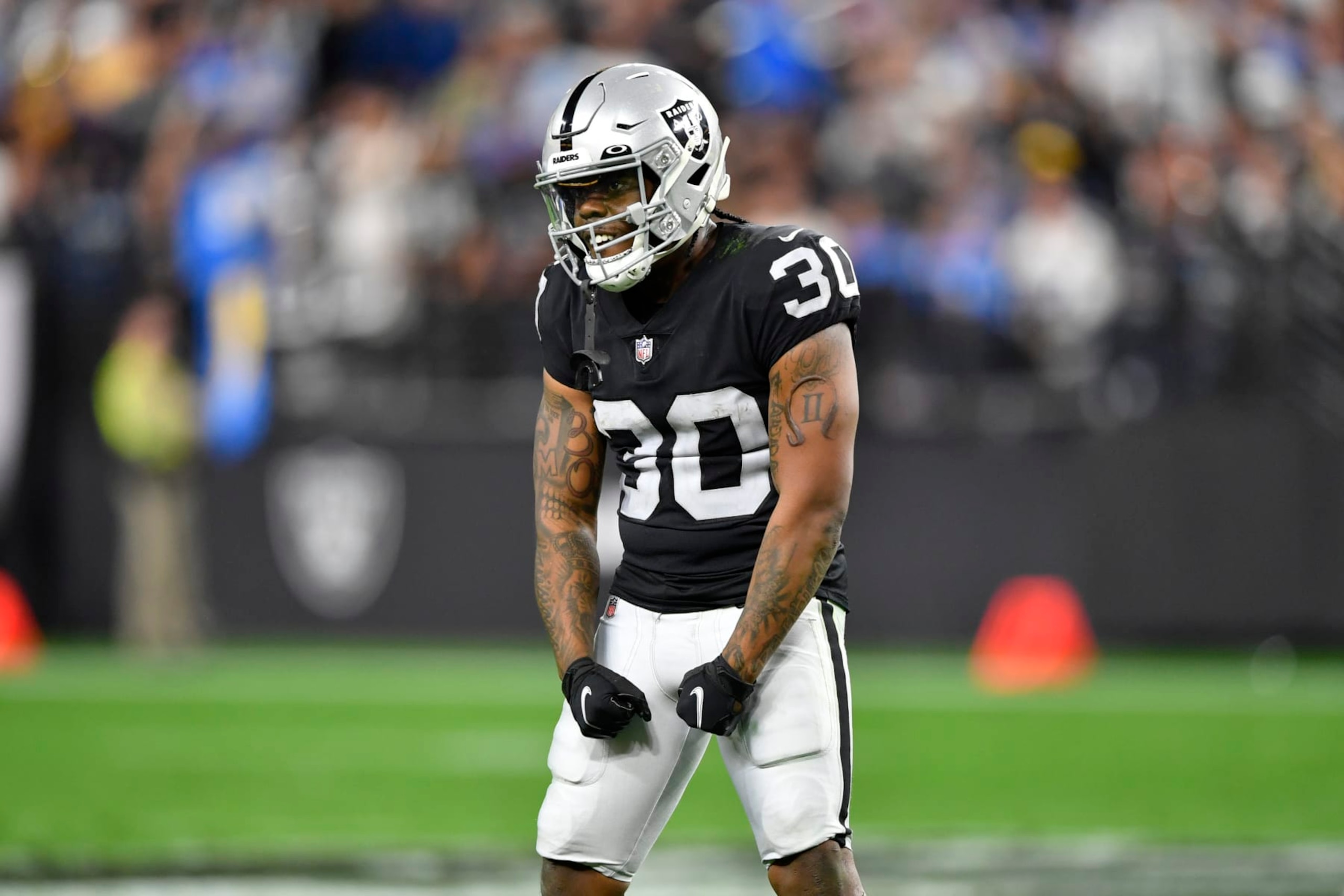 LAS VEGAS, NEVADA - JANUARY 09:  Running back Jalen Richard #30 of the Las Vegas Raiders reacts after a play during the first half of a game against the Los Angeles Chargers at Allegiant Stadium on January 09, 2022 in Las Vegas, Nevada. The Raiders defeated the Chargers 35-32 in overtime. (Photo by Chris Unger/Getty Images)