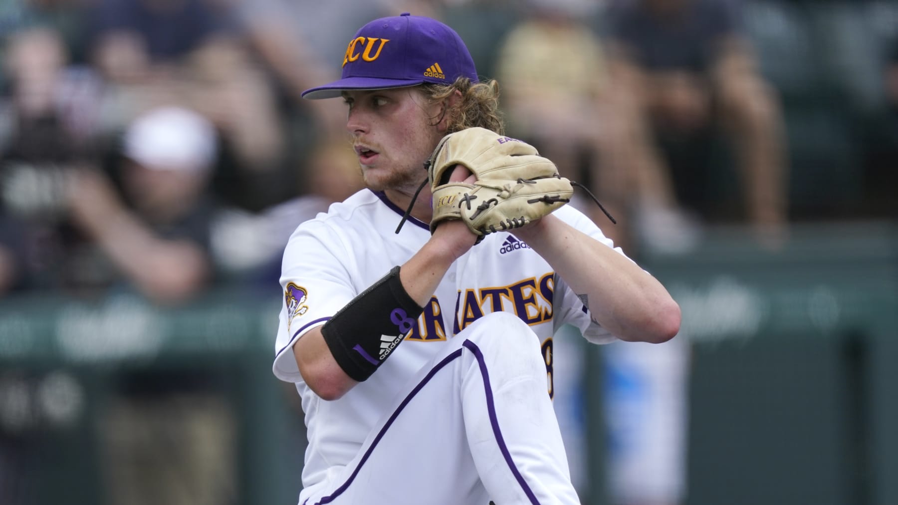 East Carolina pitcher Carson Whisenhunt throws against Vanderbilt in an NCAA college baseball super regional game Saturday, June 12, 2021, in Nashville, Tenn. (AP Photo/Mark Humphrey)
