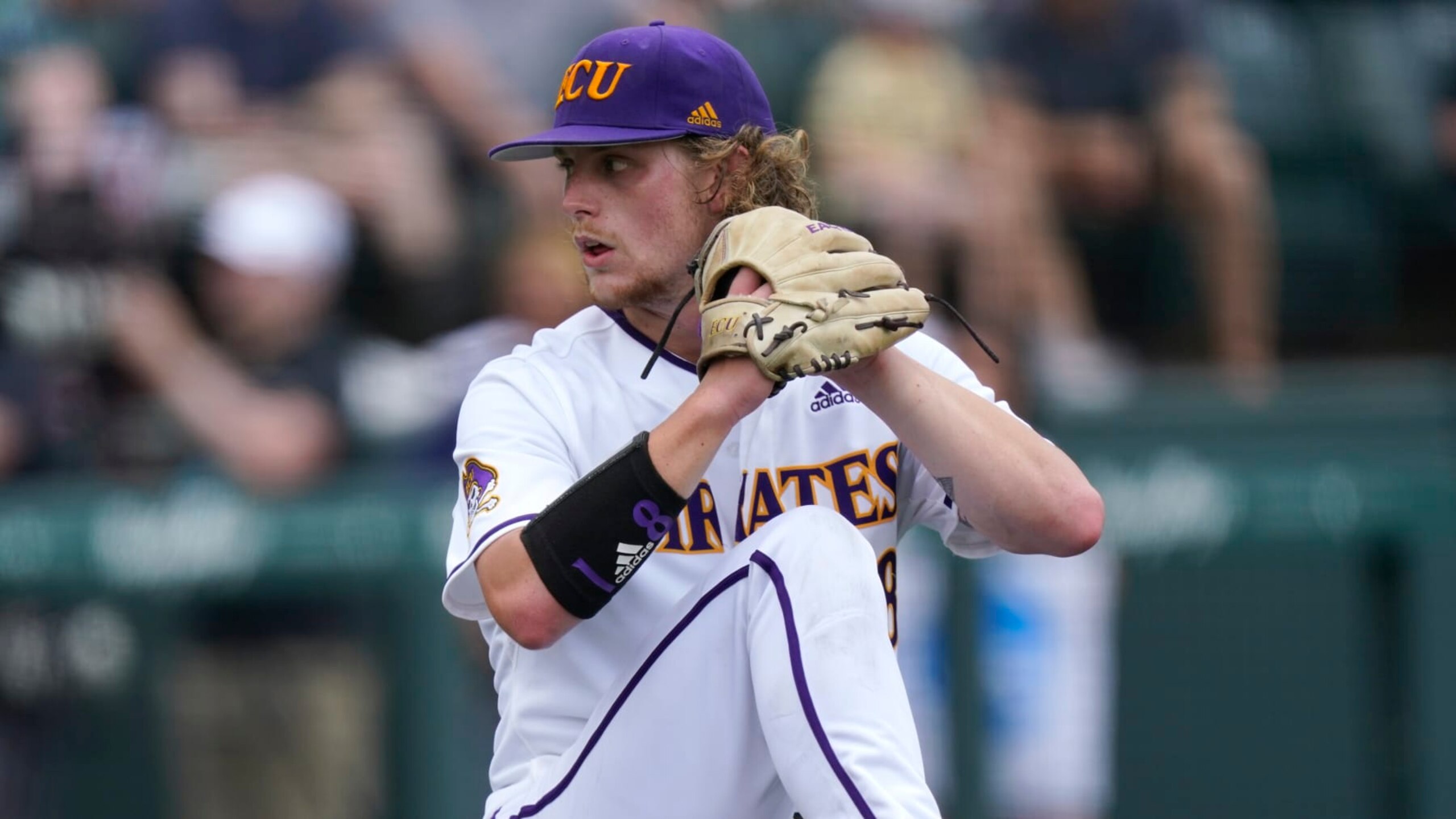 East Carolina pitcher Carson Whisenhunt throws against Vanderbilt in an NCAA college baseball super regional game Saturday, June 12, 2021, in Nashville, Tenn. (AP Photo/Mark Humphrey)