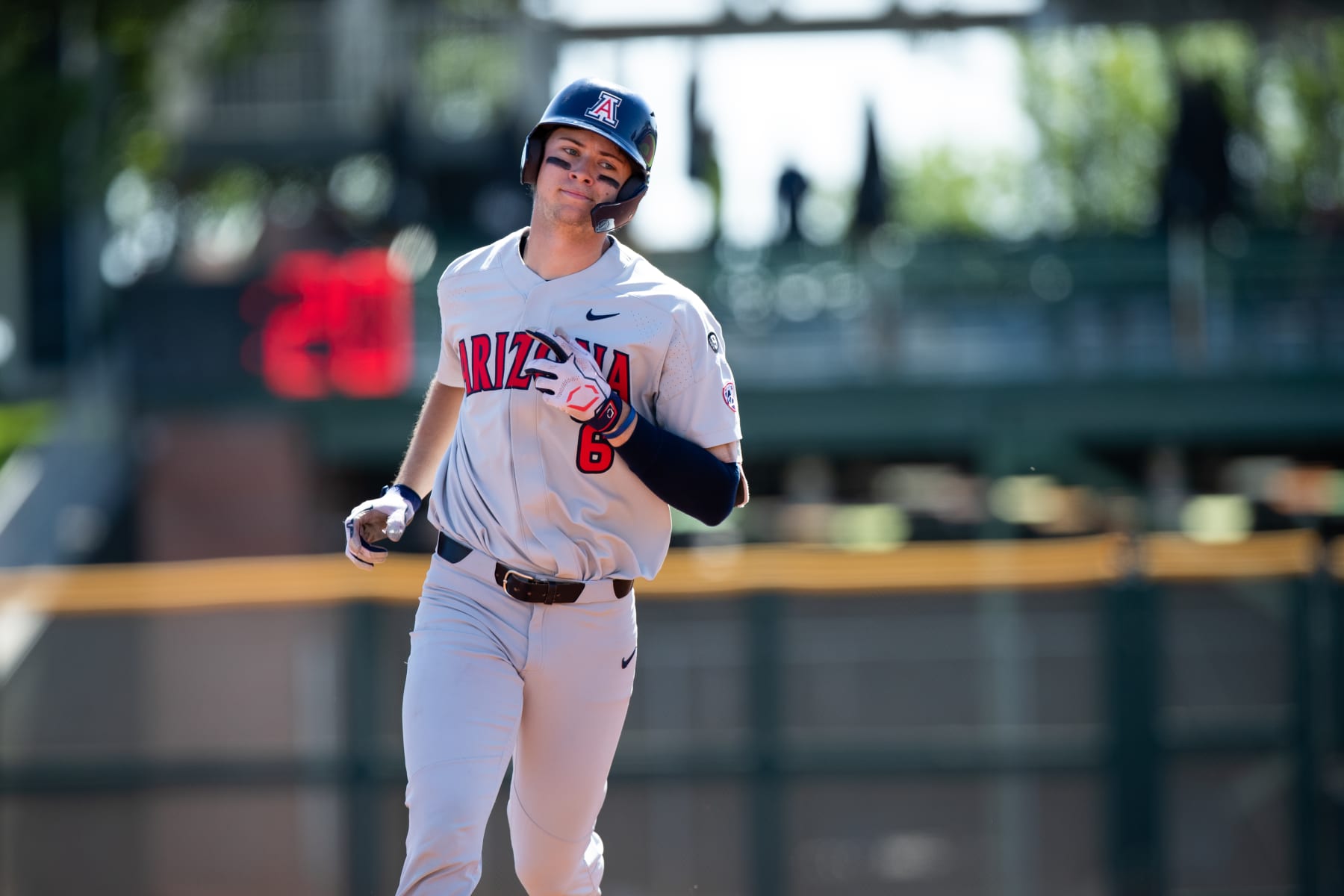 SCOTTSDALE, AZ - MAY 25: Arizona Wildcats Catcher Daniel Susac (6)  celebrates a home run rounding third base during game 1 of the PAC12 Baseball Tournament between the Arizona Wildcats and the Oregon Ducks on May 25, 2022, at Scottsdale Stadium, AZ. (Photo by Zac BonDurant/Icon Sportswire via Getty Images)