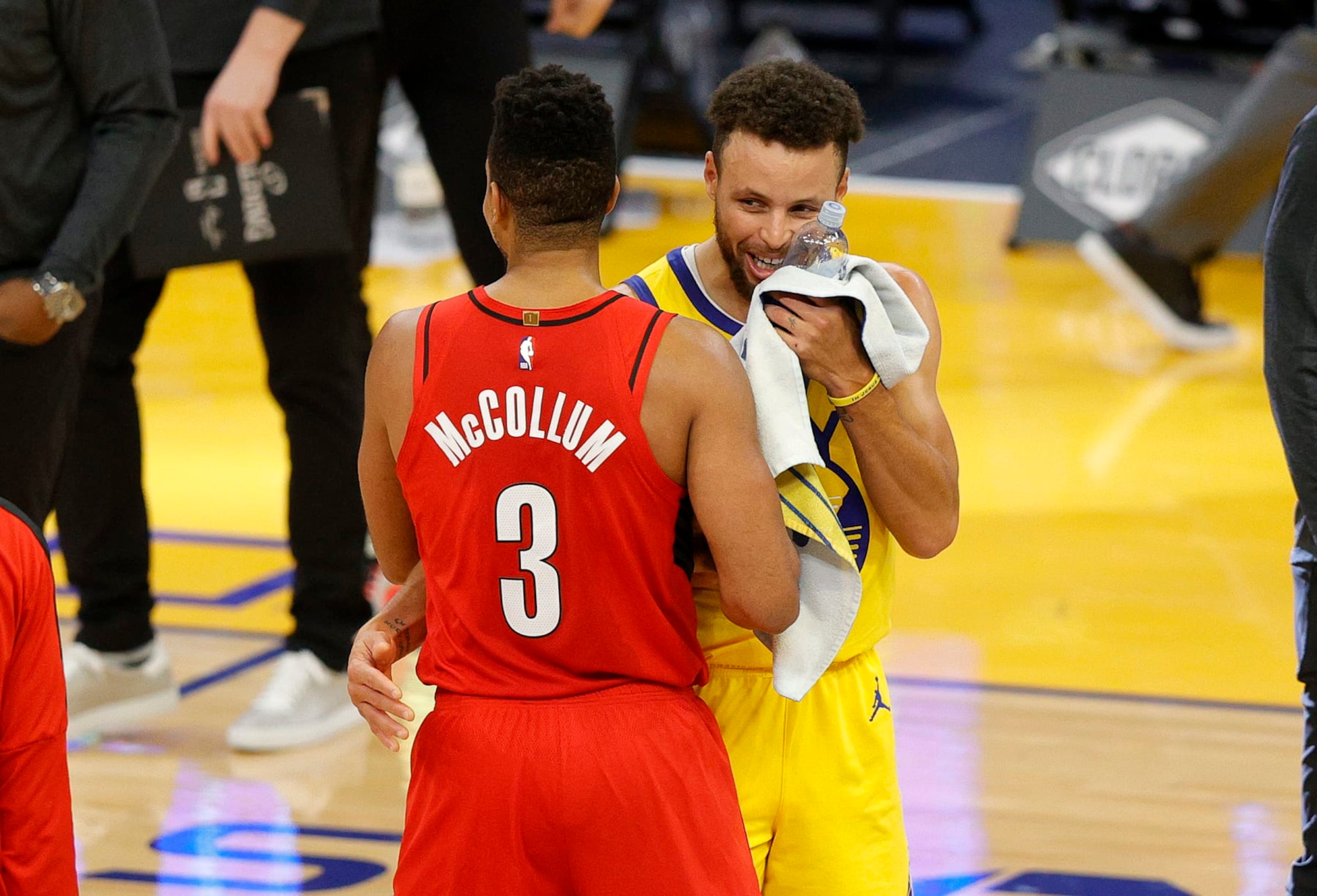 SAN FRANCISCO, CALIFORNIA - JANUARY 03: Stephen Curry #30 of the Golden State Warriors is congratulated by CJ McCollum #3 of the Portland Trail Blazers after Curry scored a career-high 62 points against the Portland Trail Blazers at Chase Center on January 03, 2021 in San Francisco, California. NOTE TO USER: User expressly acknowledges and agrees that, by downloading and or using this photograph, User is consenting to the terms and conditions of the Getty Images License Agreement. (Photo by Ezra Shaw/undefined) SAN FRANCISCO, CALIFORNIA - JANUARY 03: Stephen Curry #30 of the Golden State Warriors is congratulated by CJ McCollum #3 of the Portland Trail Blazers after Curry scored a career-high 62 points against the Portland Trail Blazers at Chase Center on January 03, 2021 in San Francisco, California. NOTE TO USER: User expressly acknowledges and agrees that, by downloading and or using this photograph, User is consenting to the terms and conditions of the Getty Images License Agreement. (Photo by Ezra Shaw/undefined)