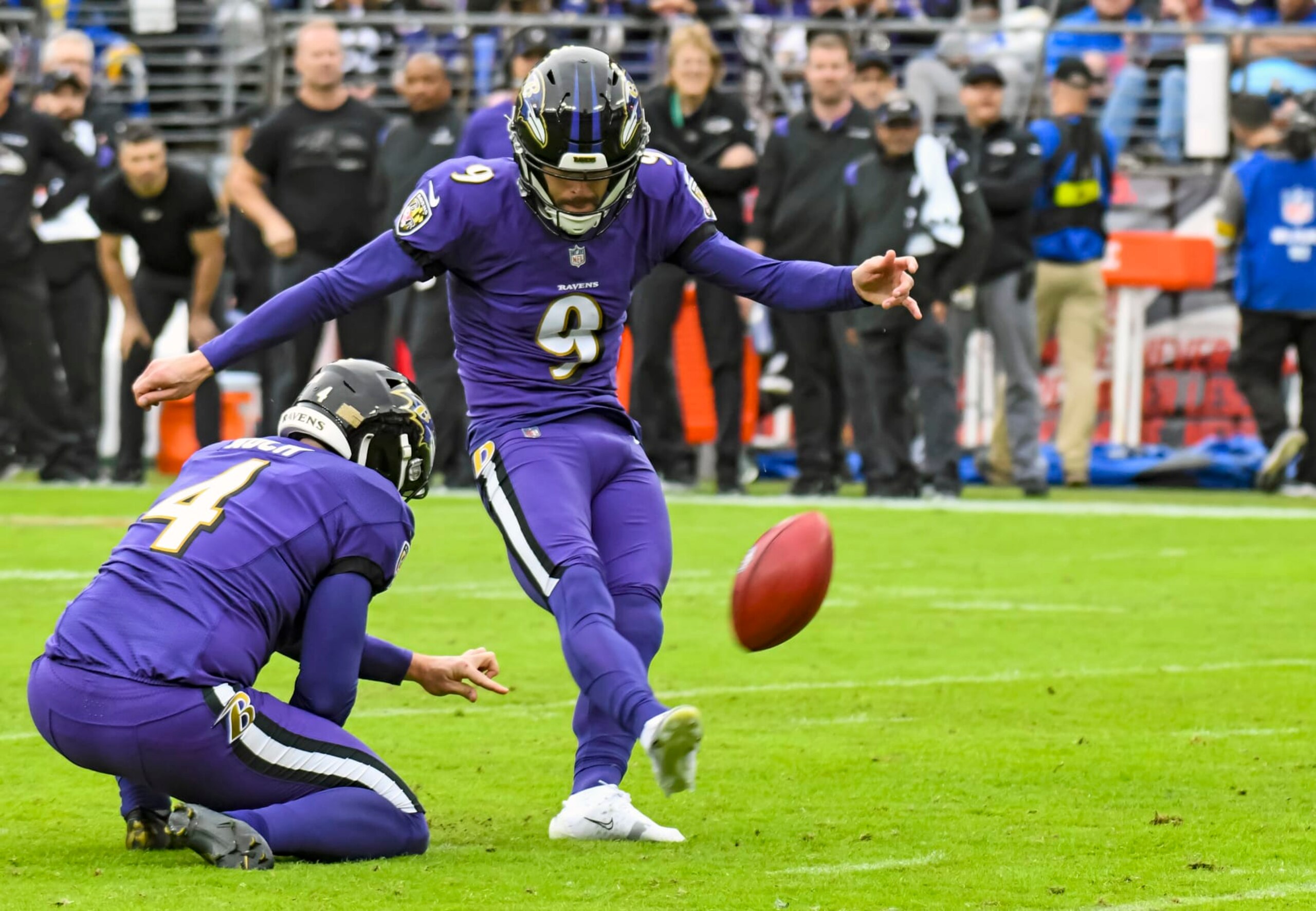 BALTIMORE, MD - JANUARY 02: Baltimore Ravens kicker Justin Tucker (9) kicks a field goal out of the hold of punter Sam Koch (4) during the Los Angeles Rams game versus the Baltimore Ravens on January 2, 2022 at M&T Bank Stadium in Baltimore, MD.  (Photo by Mark Goldman/Icon Sportswire via Getty Images)