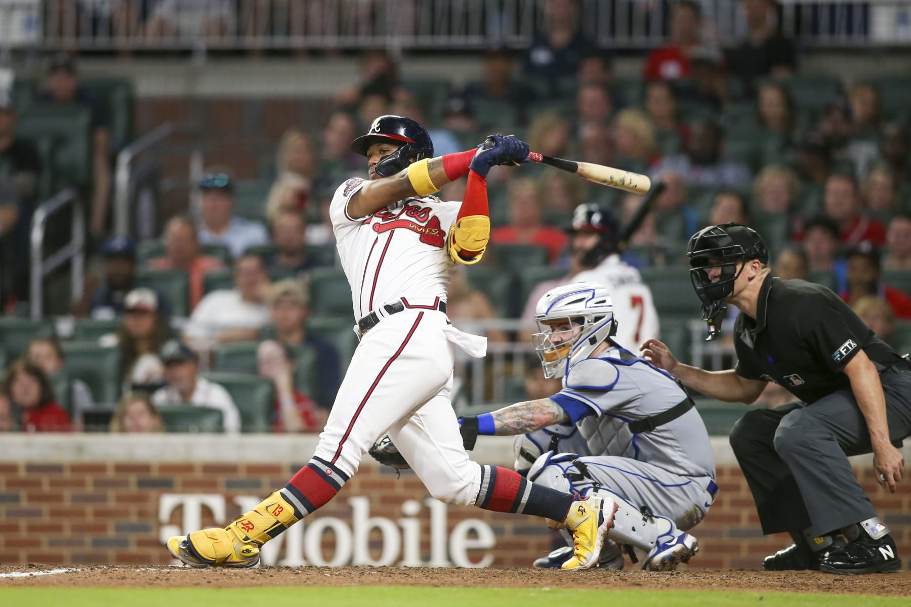 ATLANTA, GA - JULY 11: Ronald Acuna Jr. #13 of the Atlanta Braves hits a double against the New York Mets in the eighth inning at Truist Park on July 11, 2022 in Atlanta, Georgia. (Photo by Brett Davis/Getty Images)