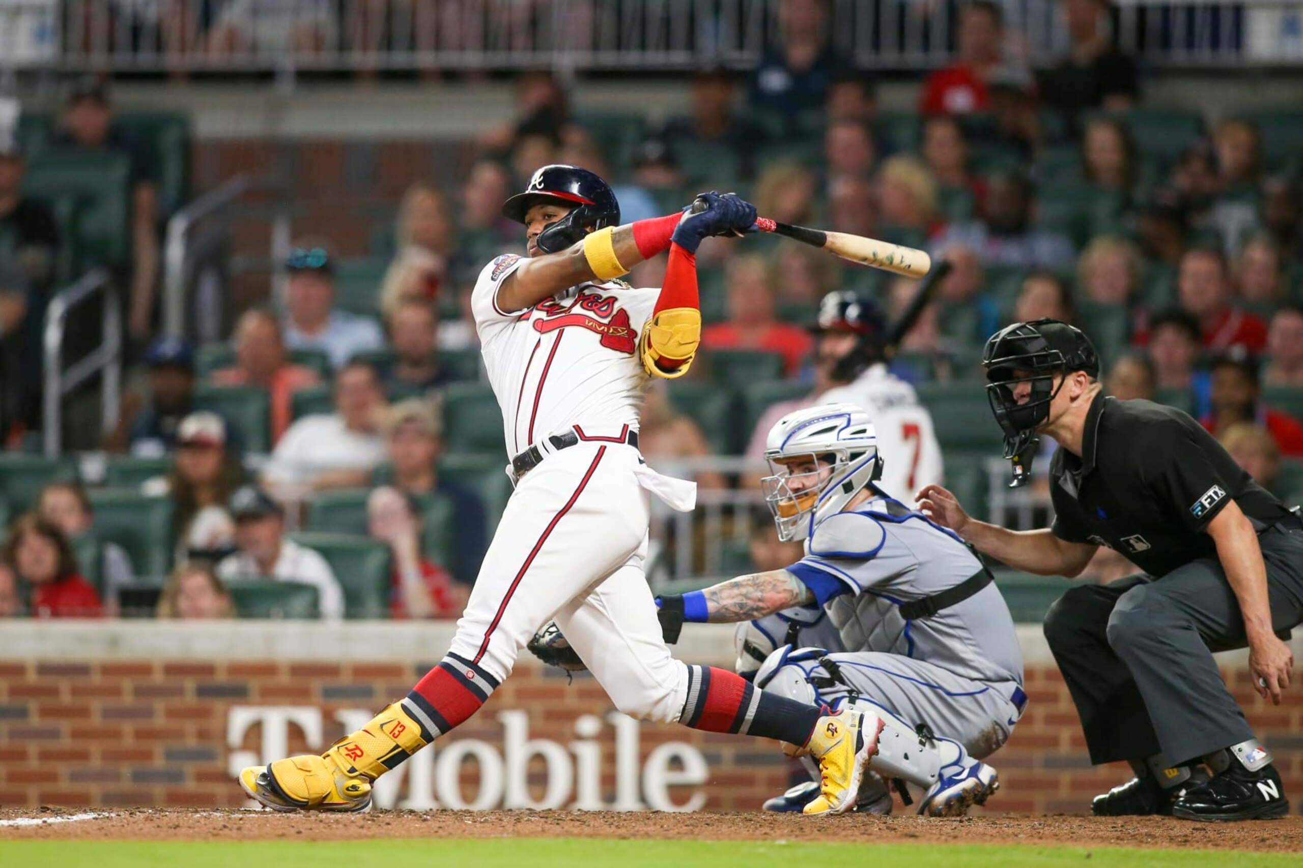 ATLANTA, GA - JULY 11: Ronald Acuna Jr. #13 of the Atlanta Braves hits a double against the New York Mets in the eighth inning at Truist Park on July 11, 2022 in Atlanta, Georgia. (Photo by Brett Davis/Getty Images)