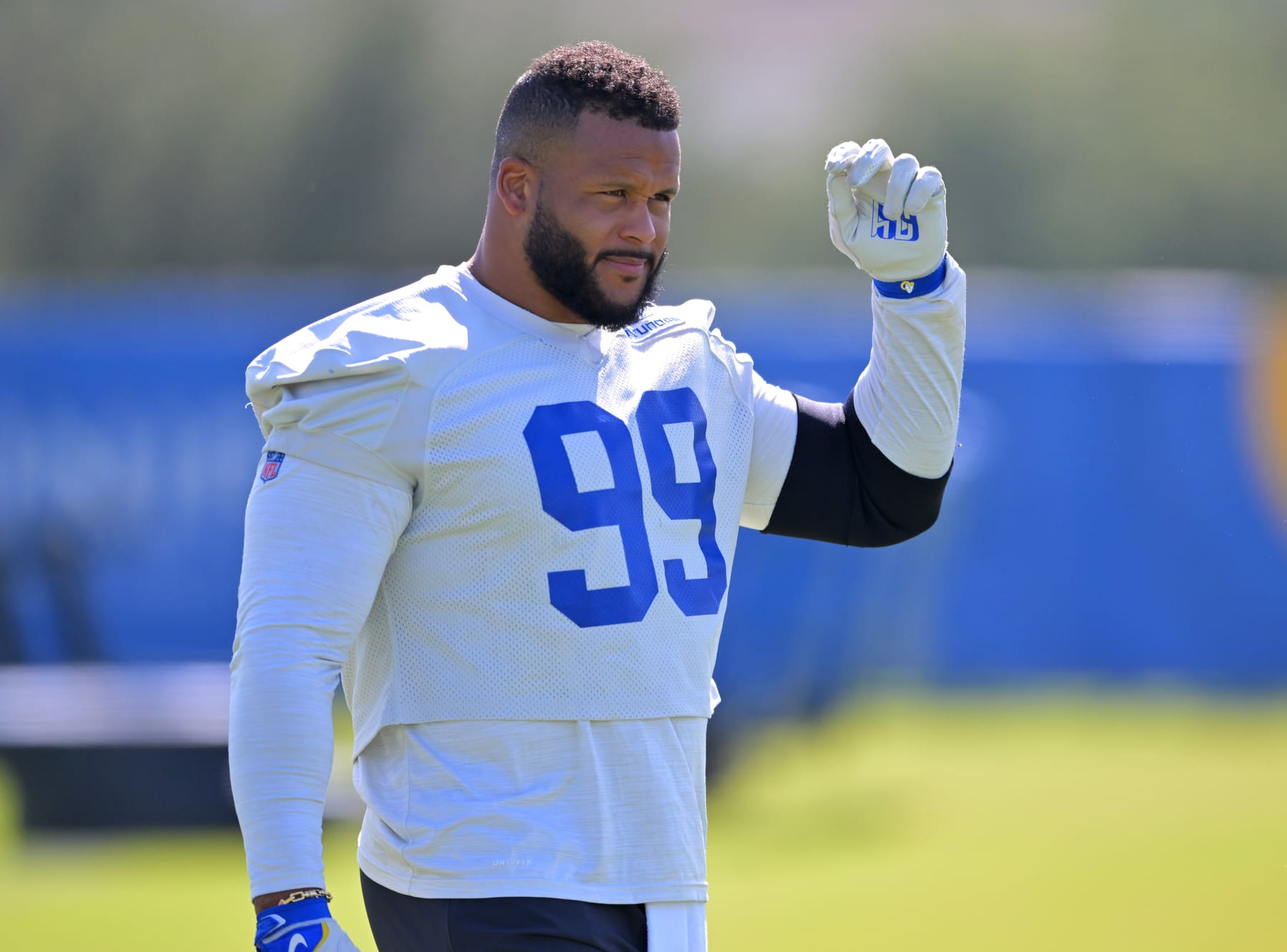 THOUSAND OAKS, CA - JUNE 8: Aaron Donald #99 of the Los Angeles Rams looks on during mini camp on June 8, 2022 at the team's facility at California Lutheran University in Thousand Oaks, California. (Photo by Jayne Kamin-Oncea/Getty Images) THOUSAND OAKS, CA - JUNE 8: Aaron Donald #99 of the Los Angeles Rams looks on during mini camp on June 8, 2022 at the team's facility at California Lutheran University in Thousand Oaks, California. (Photo by Jayne Kamin-Oncea/Getty Images)