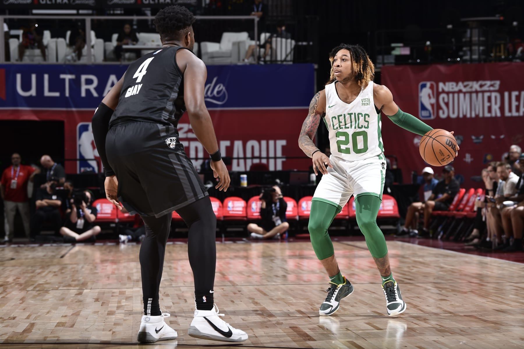 LAS VEGAS, NV - JULY 16: JD Davison #20 of the Boston Celtics drives to the basket during the game against the Brooklyn Nets during the 2022 Las Vegas Summer League on July 16, 2022 at the Cox Pavilion in Las Vegas, Nevada NOTE TO USER: User expressly acknowledges and agrees that, by downloading and/or using this Photograph, user is consenting to the terms and conditions of the Getty Images License Agreement. Mandatory Copyright Notice: Copyright 2022 NBAE (Photo by David Dow/NBAE via Getty Images)