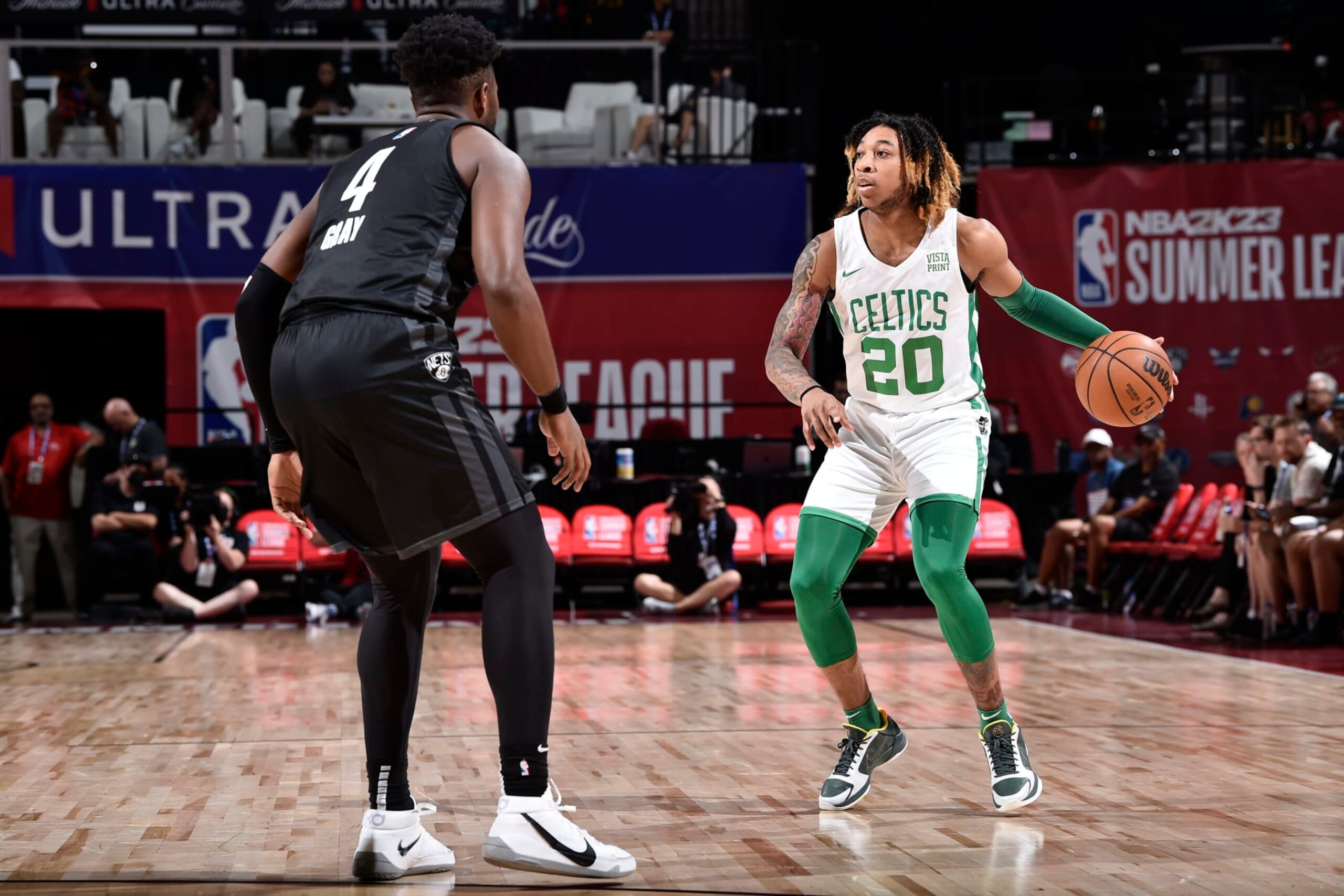 LAS VEGAS, NV - JULY 16: JD Davison #20 of the Boston Celtics drives to the basket during the game against the Brooklyn Nets during the 2022 Las Vegas Summer League on July 16, 2022 at the Cox Pavilion in Las Vegas, Nevada NOTE TO USER: User expressly acknowledges and agrees that, by downloading and/or using this Photograph, user is consenting to the terms and conditions of the Getty Images License Agreement. Mandatory Copyright Notice: Copyright 2022 NBAE (Photo by David Dow/NBAE via Getty Images)