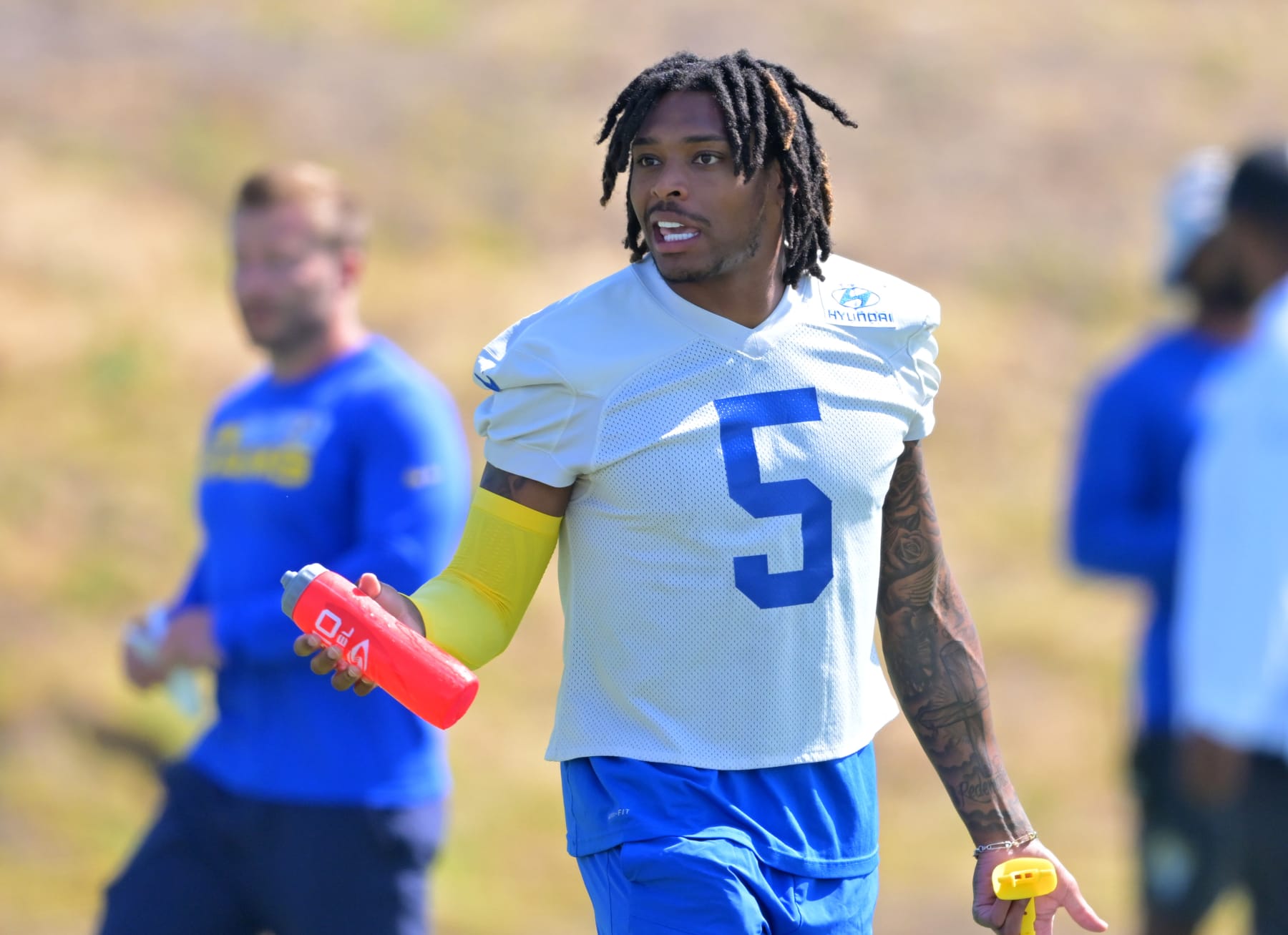 THOUSAND OAKS, CA - JUNE 8: Jalen Ramsey #5 of the Los Angeles Rams talks with players of the field during mini camp on June 8, 2022 at the team's facility at California Lutheran University in Thousand Oaks, California. (Photo by Jayne Kamin-Oncea/Getty Images)