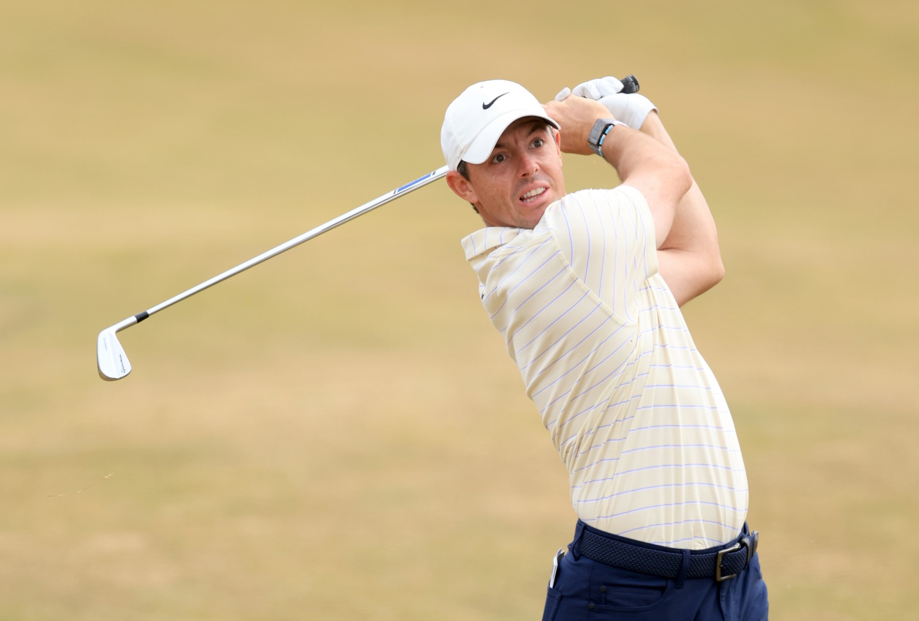 ST ANDREWS, SCOTLAND - JULY 17: Rory McIlroy of Northern Ireland plays his second shot on the fifth hole during the final round of The 150th Open on The Old Course at St Andrews on July 17, 2022 in St Andrews, Scotland. (Photo by David Cannon/Getty Images)