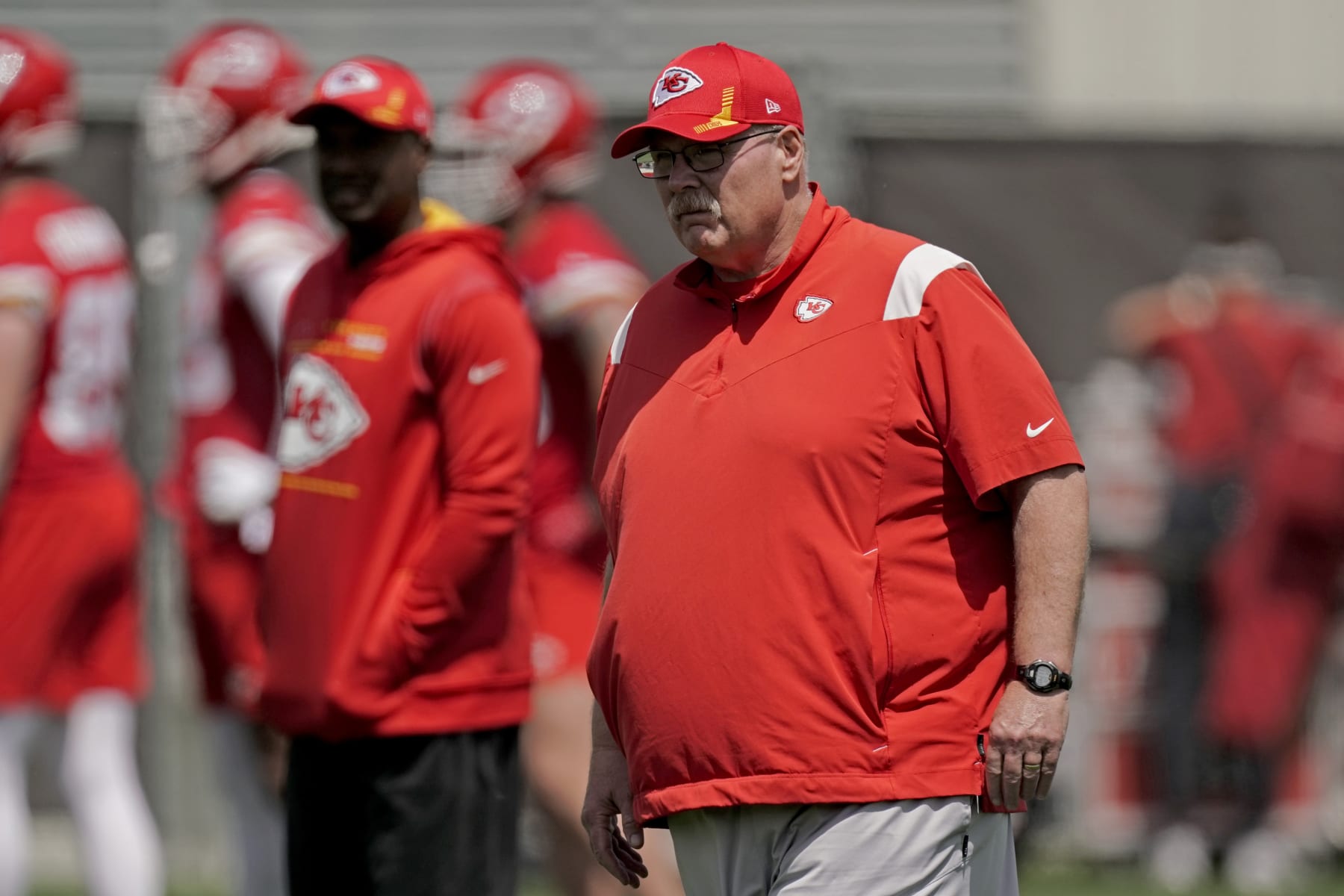 Kansas City Chiefs head coach Andy Reid watches a drill during the NFL football team's organized team activities Thursday, June 2, 2022, in Kansas City, Mo. (AP Photo/Charlie Riedel)