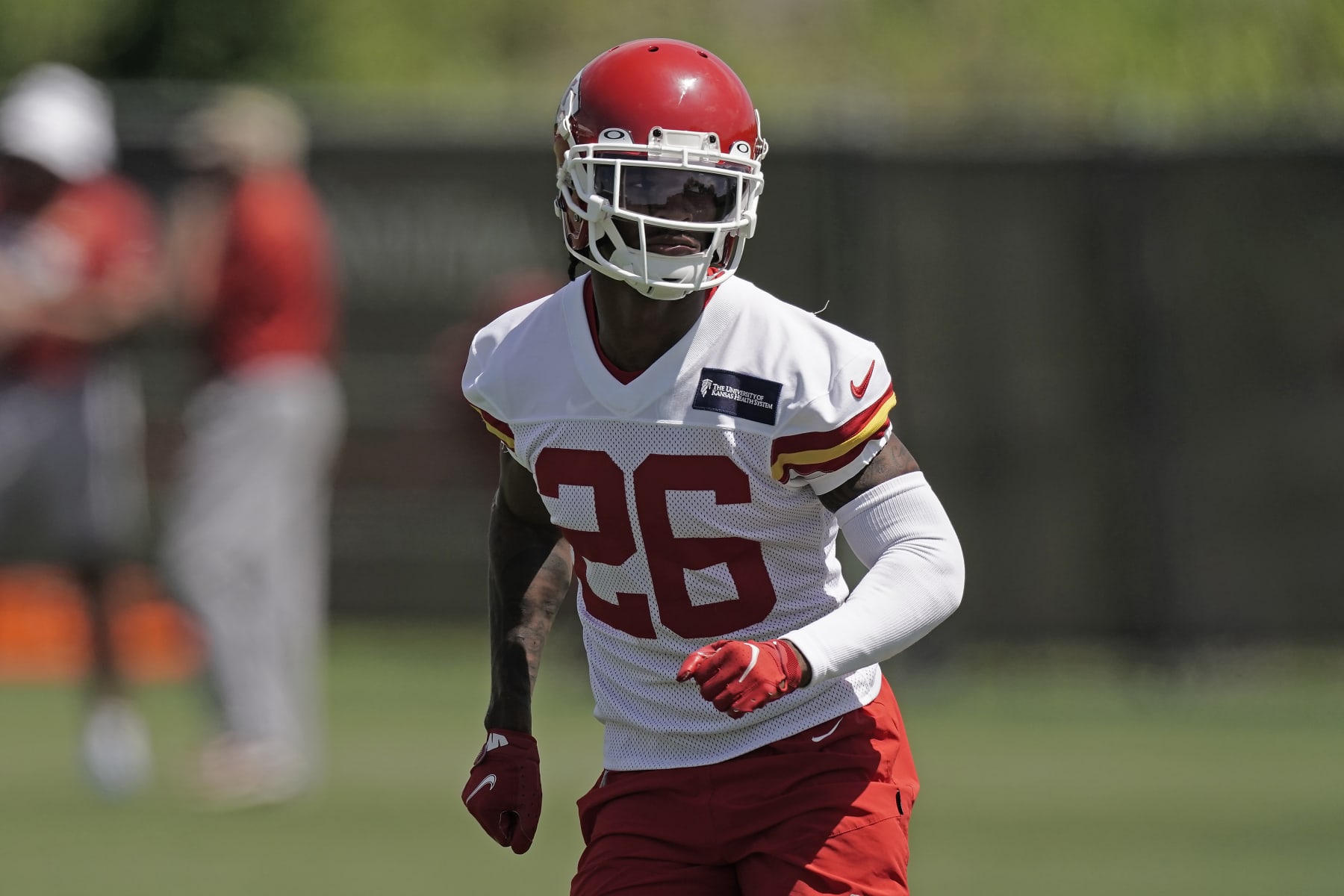 Kansas City Chiefs defensive end Deon Bush runs during the NFL football team's organized team activities Thursday, June 9, 2022, in Kansas City, Mo. (AP Photo/Charlie Riedel)
