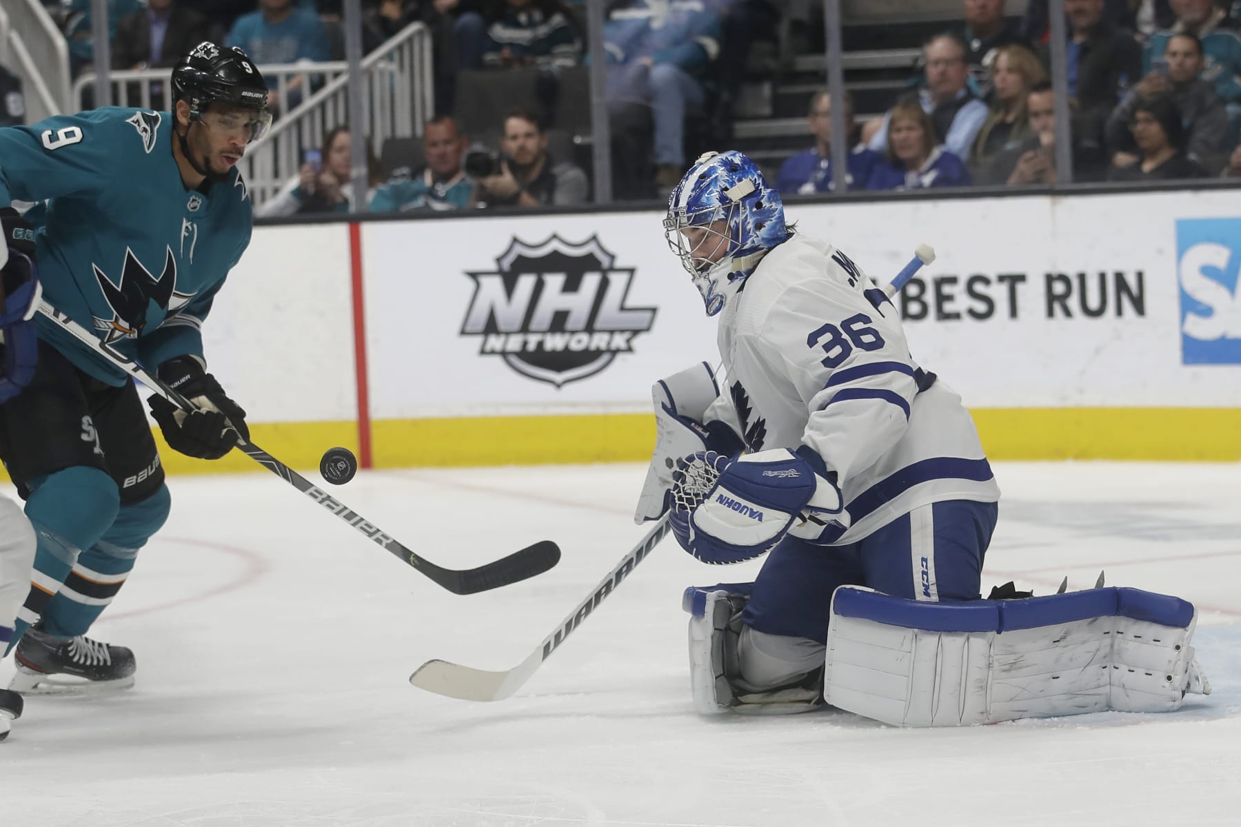 Toronto Maple Leafs goaltender Jack Campbell (36) defends a shot in front of San Jose Sharks left wing Evander Kane (9) during the first period of an NHL hockey game in San Jose, Calif., Tuesday, March 3, 2020. (AP Photo/Jeff Chiu)