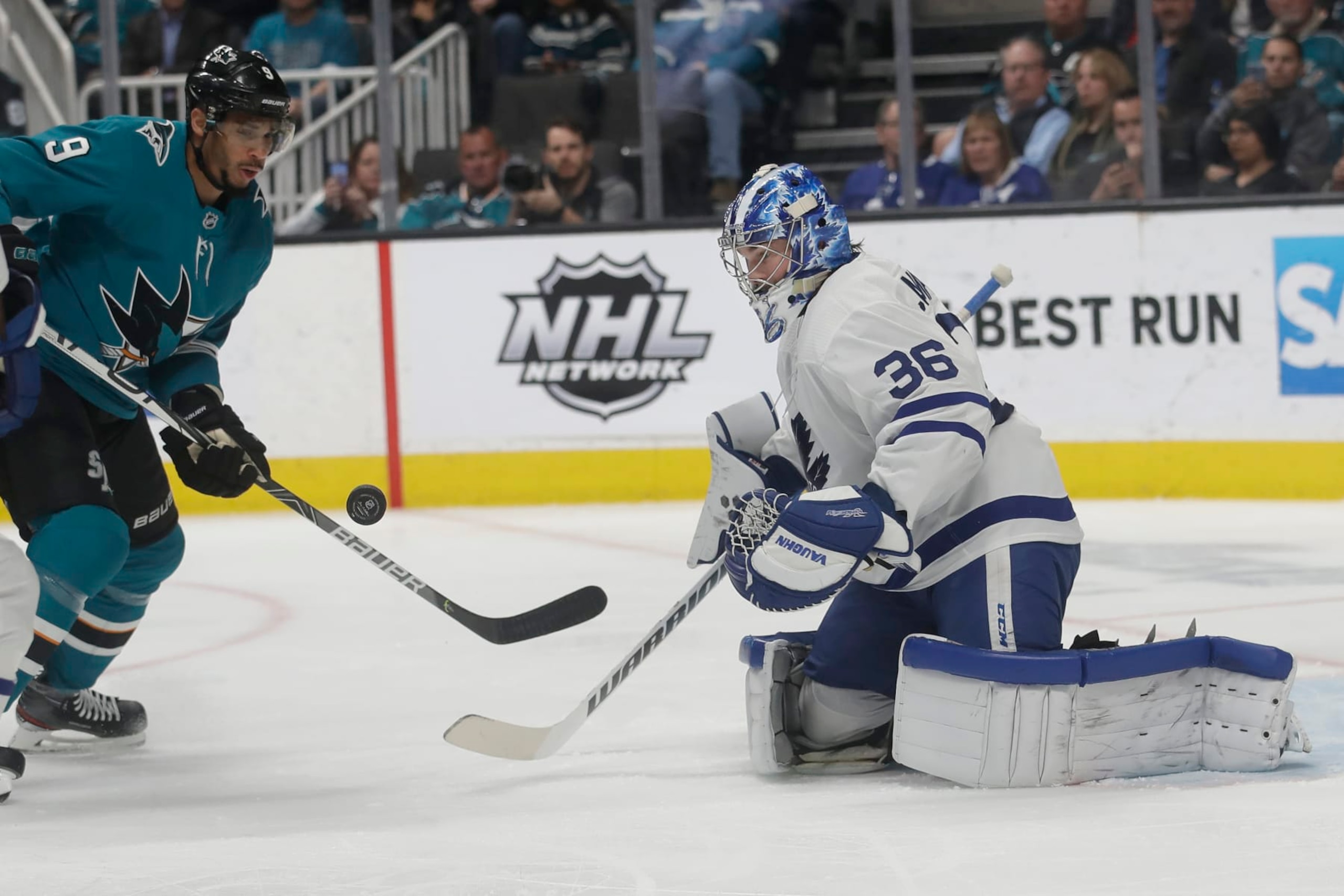Toronto Maple Leafs goaltender Jack Campbell (36) defends a shot in front of San Jose Sharks left wing Evander Kane (9) during the first period of an NHL hockey game in San Jose, Calif., Tuesday, March 3, 2020. (AP Photo/Jeff Chiu)