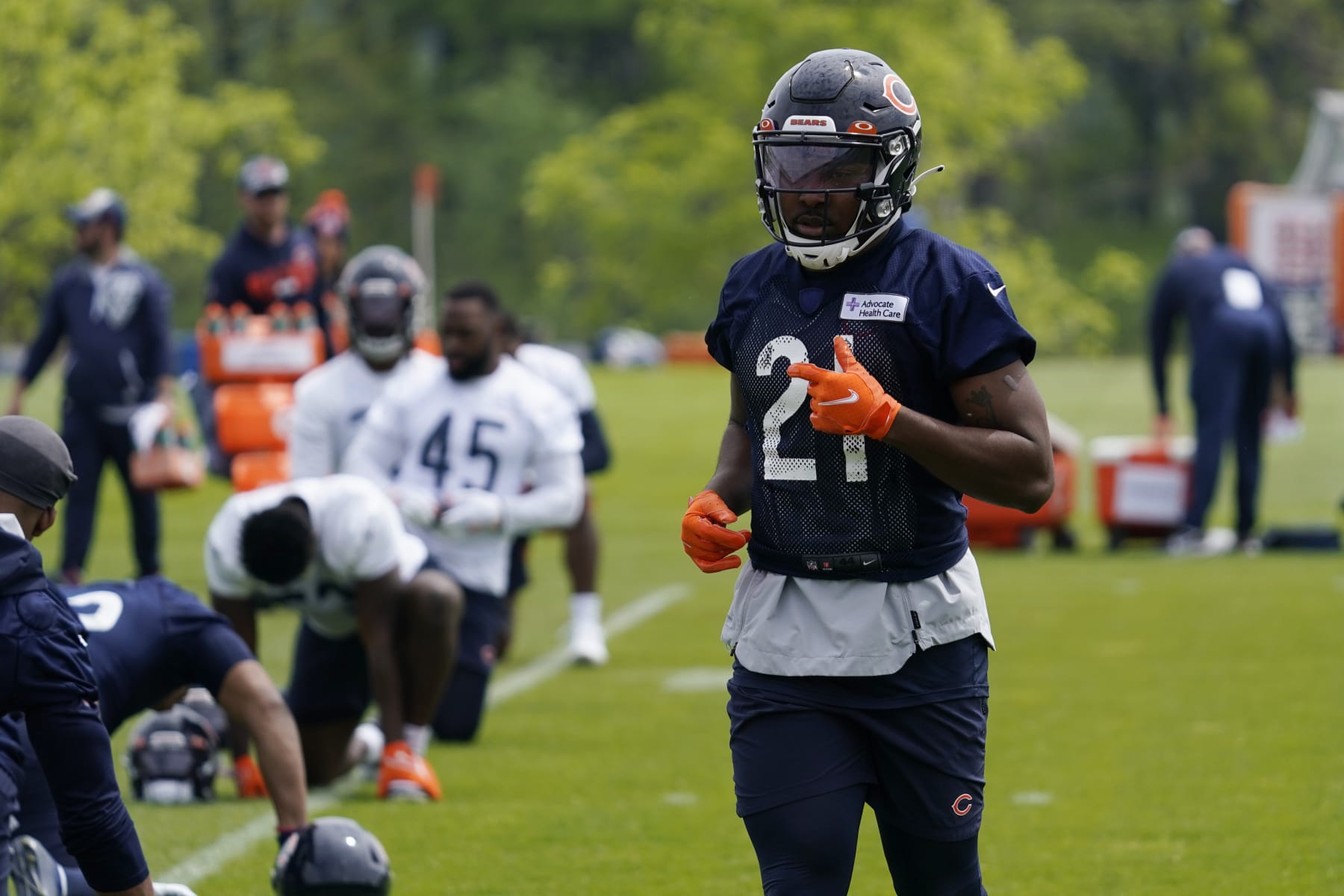 Chicago Bears running back Darrynton Evans warms up at the NFL football team's practice facility in Lake Forest, Ill., Tuesday, May 24, 2022. (AP Photo/Nam Y. Huh)