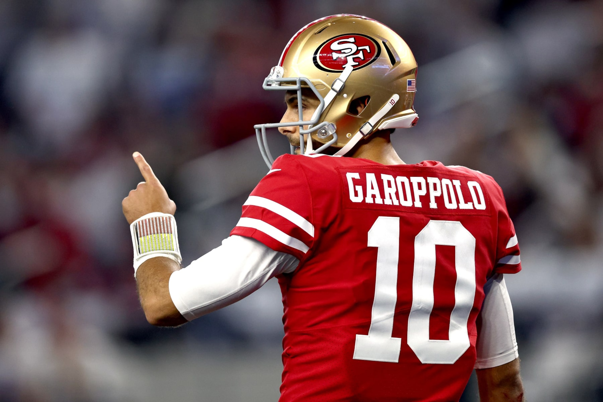 ARLINGTON, TEXAS - JANUARY 16: Jimmy Garoppolo #10 of the San Francisco 49ers reacts during the third quarter against the Dallas Cowboys in the NFC Wild Card Playoff game at AT&T Stadium on January 16, 2022 in Arlington, Texas. (Photo by Tom Pennington/Getty Images)