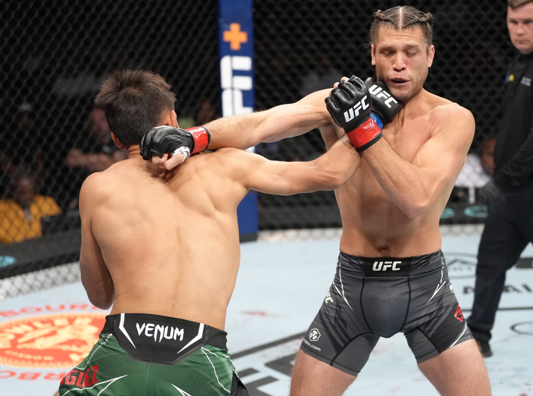 ELMONT, NEW YORK - JULY 16: (L-R) Yair Rodriguez of Mexico punches Brian Ortega in a featherweight fight during the UFC Fight Night event at UBS Arena on July 16, 2022 in Elmont, New York. (Photo by Jeff Bottari/Zuffa LLC)