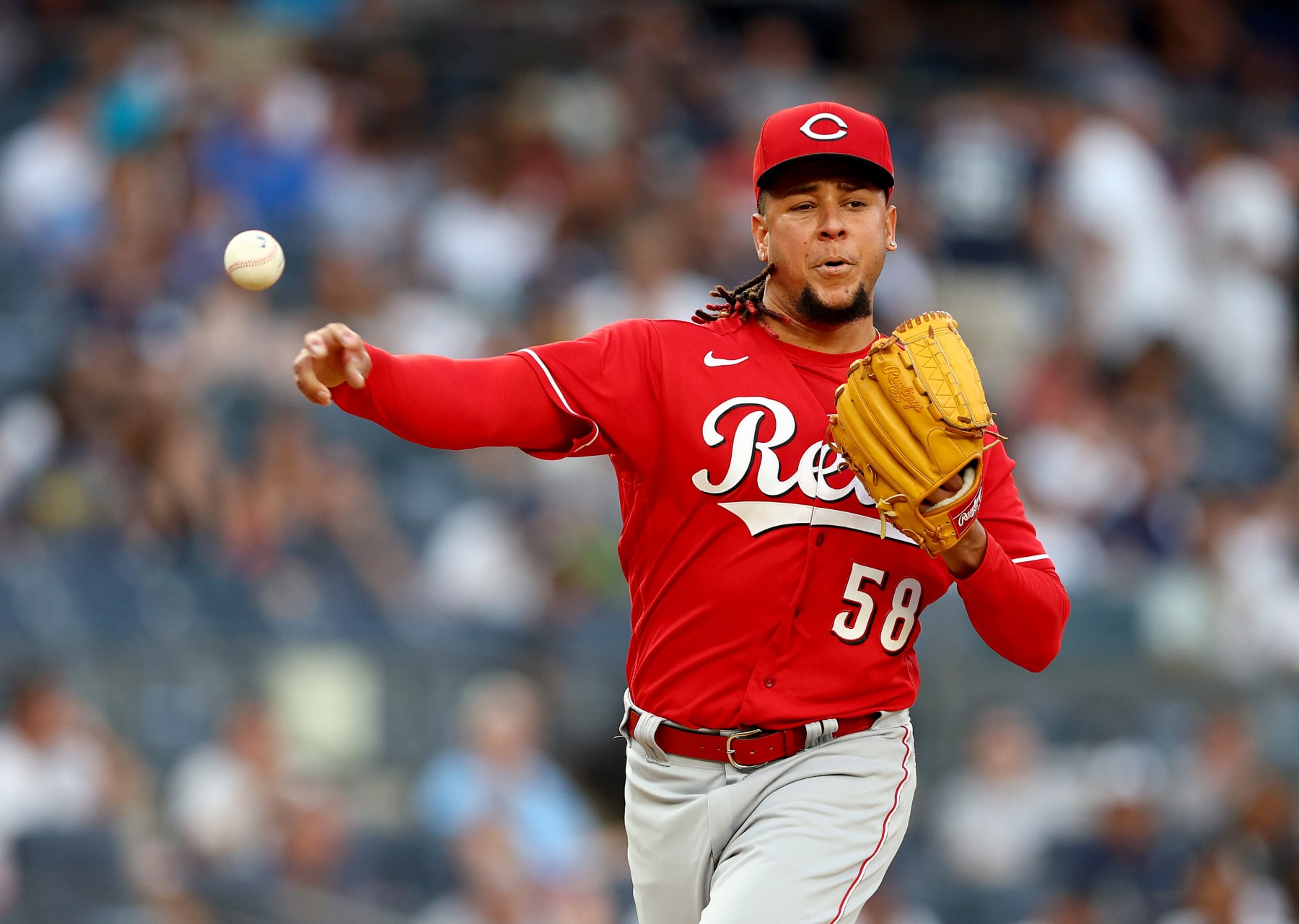 NEW YORK, NEW YORK - JULY 14:  Luis Castillo #58 of the Cincinnati Reds tries to pick off Aaron Judge #99 of the New York Yankees at first base in the first inning at Yankee Stadium on July 14, 2022 in the Bronx borough of New York City. (Photo by Elsa/Getty Images)