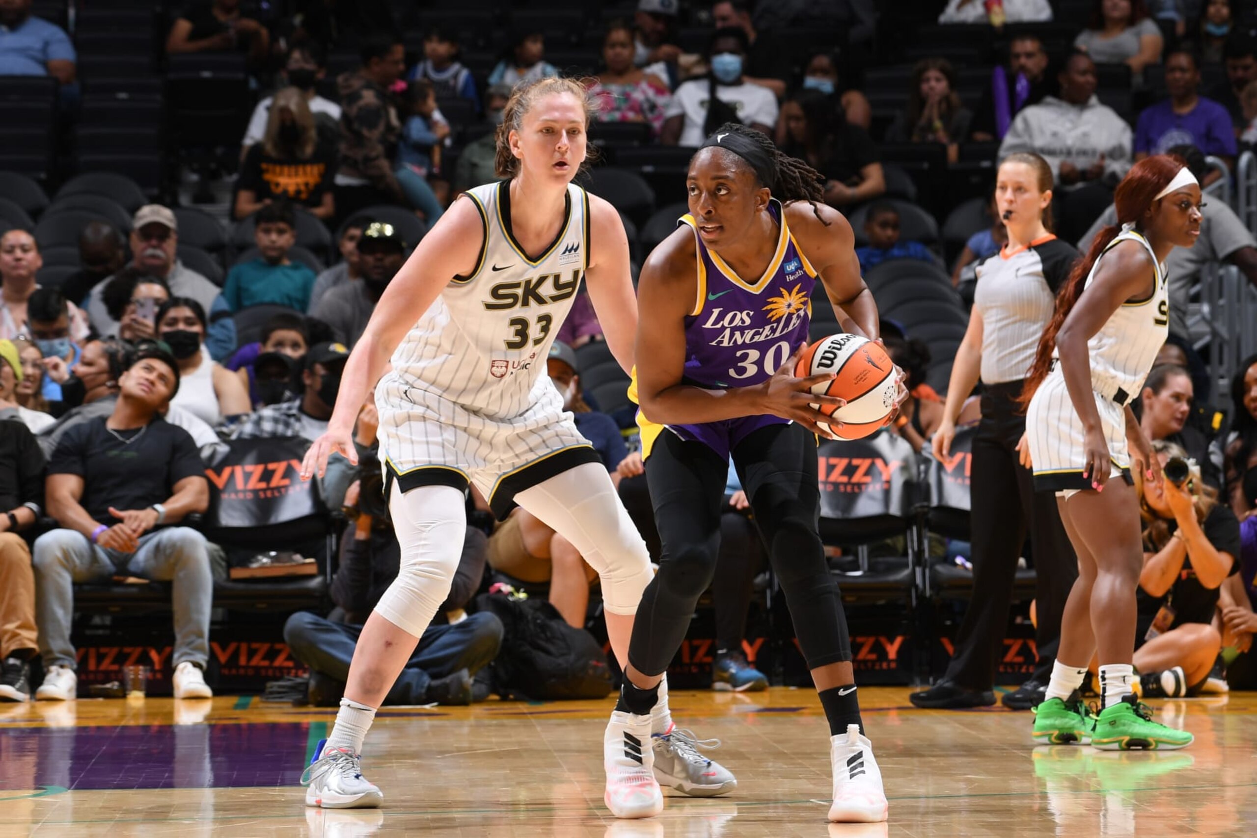 LOS ANGELES, CA - JULY 14: Nneka Ogwumike #30 of the Los Angeles Sparks handles the ball during the game against the Chicago Sky on July 14, 2022 at Crypto.com Arena in Los Angeles, California. NOTE TO USER: User expressly acknowledges and agrees that, by downloading and/or using this Photograph, user is consenting to the terms and conditions of the Getty Images License Agreement. Mandatory Copyright Notice: Copyright 2022 NBAE (Photo by Juan Ocampo/NBAE via Getty Images)