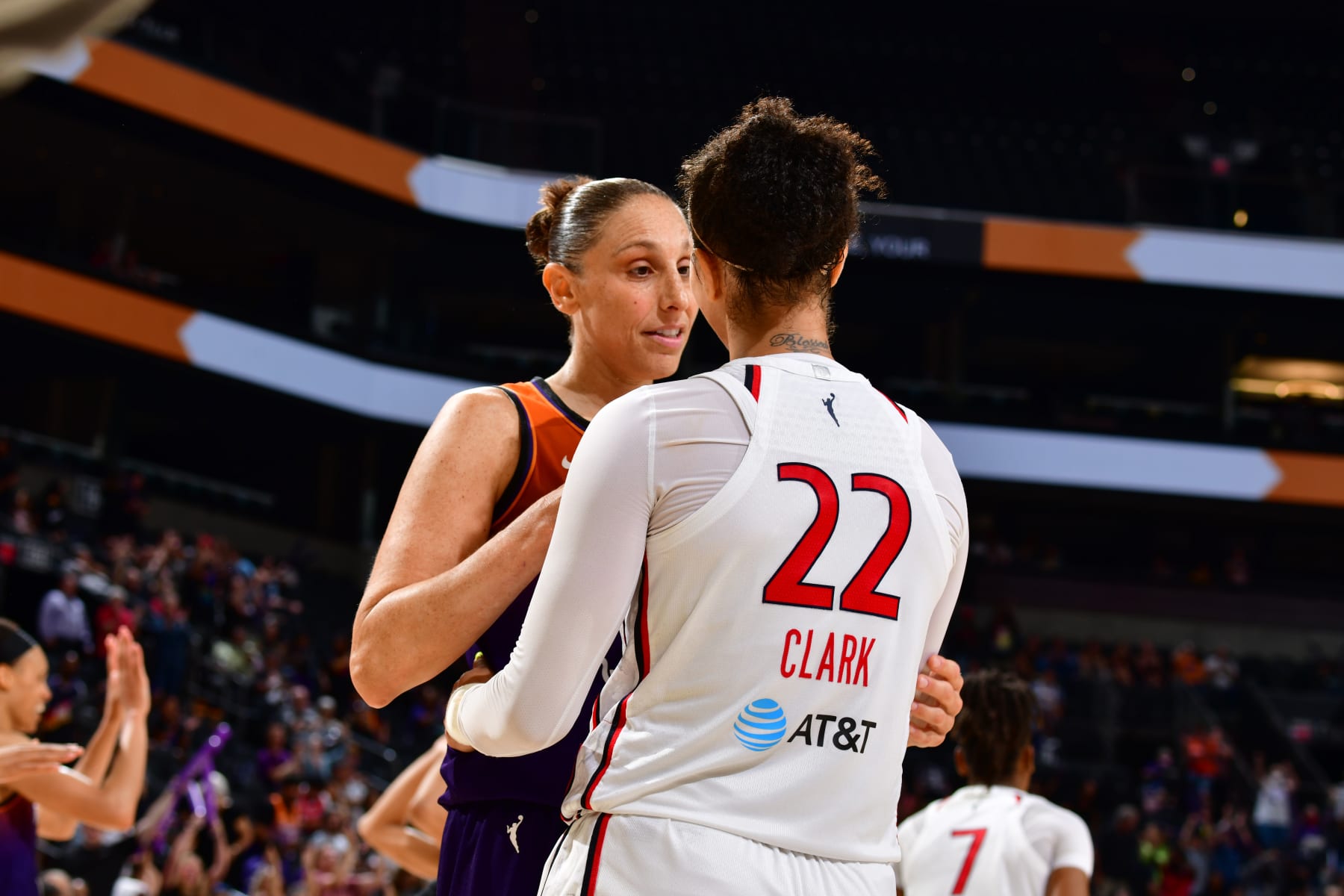 PHOENIX, AZ - JULY 14: Diana Taurasi #3 of the Phoenix Mercury hugs Alysha Clark #22 of the Washington Mystics after the game on July 14, 2022 at Footprint Center in Phoenix, Arizona. NOTE TO USER: User expressly acknowledges and agrees that, by downloading and or using this photograph, user is consenting to the terms and conditions of the Getty Images License Agreement. Mandatory Copyright Notice: Copyright 2022 NBAE (Photo by Barry Gossage/NBAE via Getty Images)