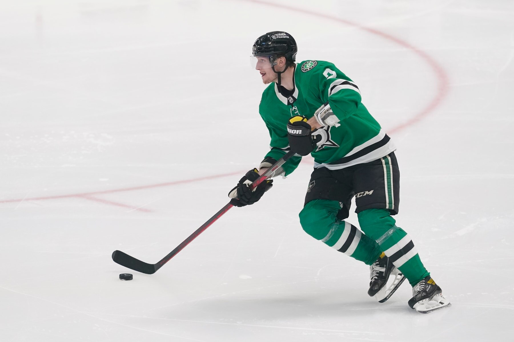 Dallas Stars defenseman John Klingberg skates against the Calgary Flames during the third period of Game 6 of an NHL hockey Stanley Cup first-round playoff series, Friday, May 13, 2022, in Dallas. (AP Photo/Tony Gutierrez)